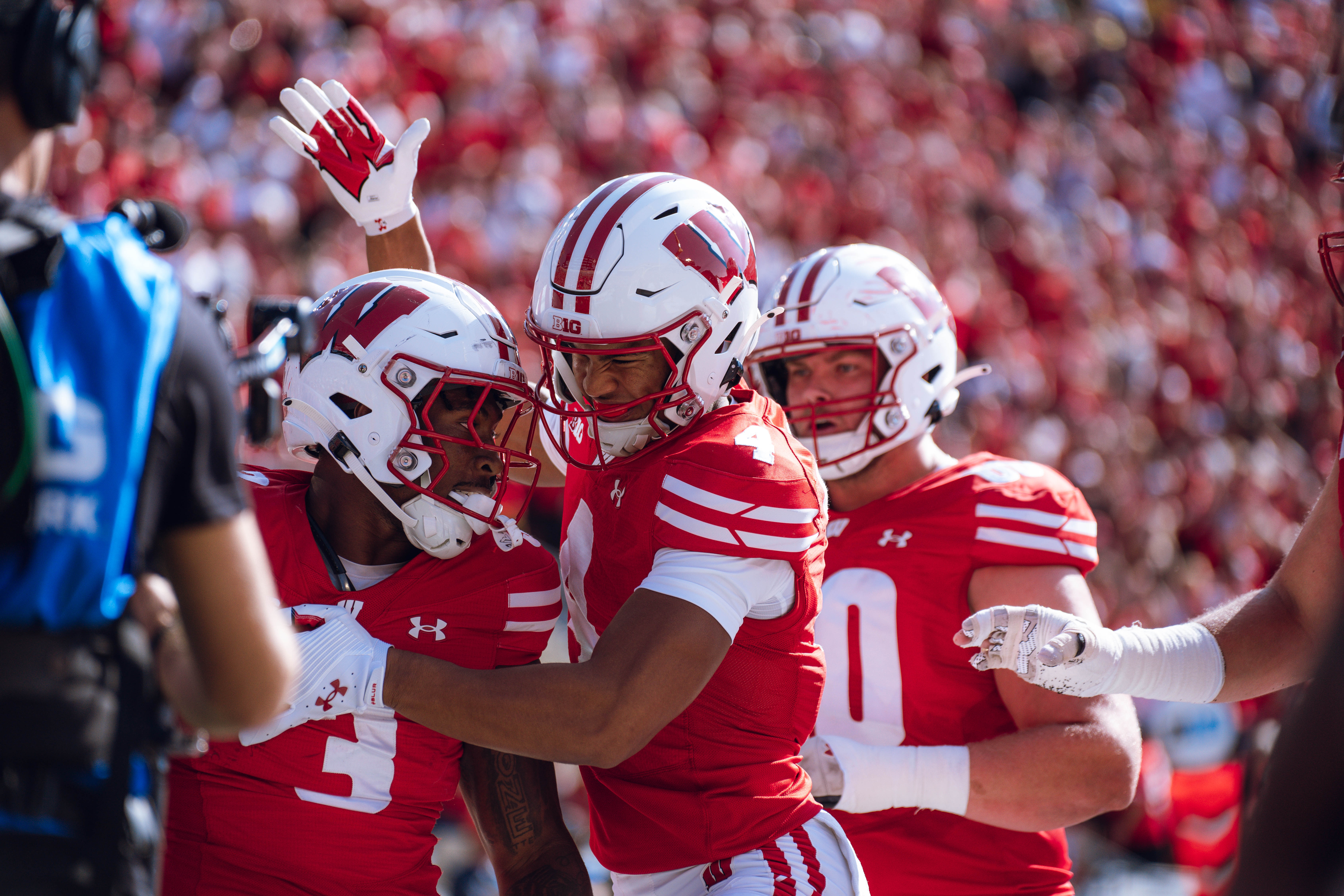 Wisconsin Badgers wide receiver C.J. Williams #4 celebrates a Tawee Walker #3 touchdown against the Purdue Boilermakers at Camp Randall Stadium on October 5, 2024 in Madison, Wisconsin. Photography by Ross Harried for Second Crop Sports.