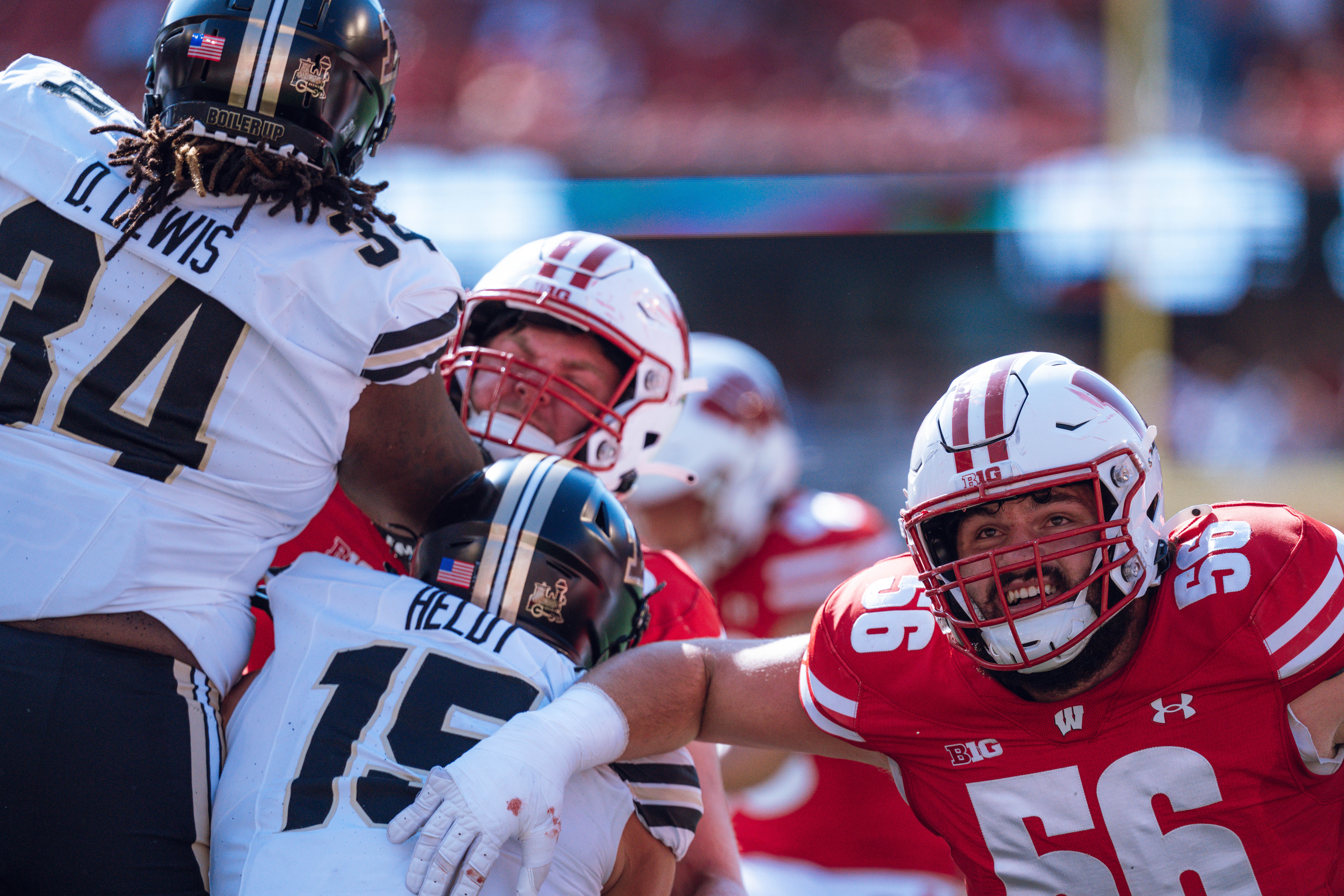 Wisconsin Badgers offensive lineman Joe Brunner #56 braces for an extra point against the Purdue Boilermakers at Camp Randall Stadium on October 5, 2024 in Madison, Wisconsin. Photography by Ross Harried for Second Crop Sports.