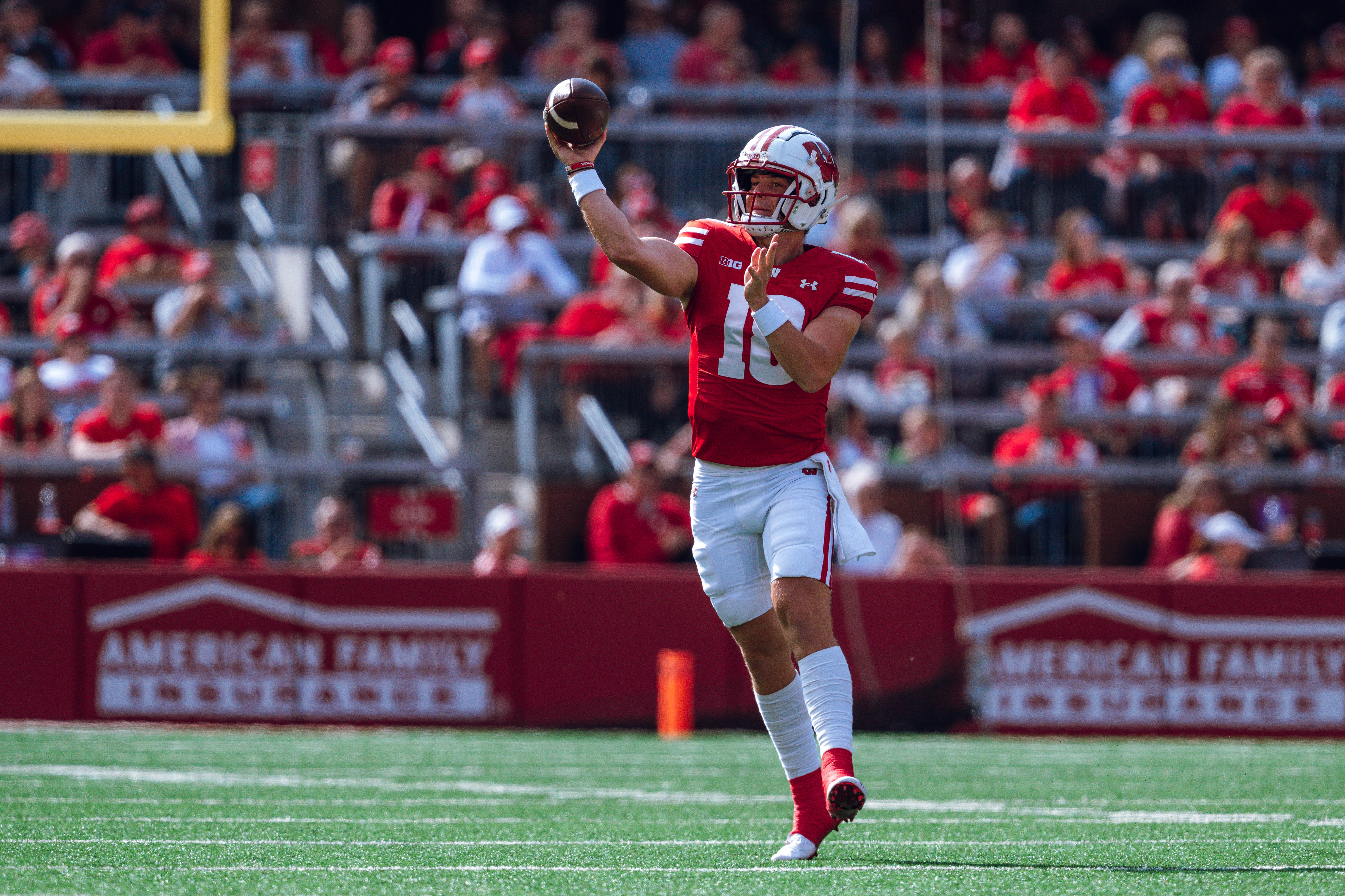 Wisconsin Badgers quarterback Braedyn Locke #18 throws a pass against the Purdue Boilermakers at Camp Randall Stadium on October 5, 2024 in Madison, Wisconsin. Photography by Ross Harried for Second Crop Sports.