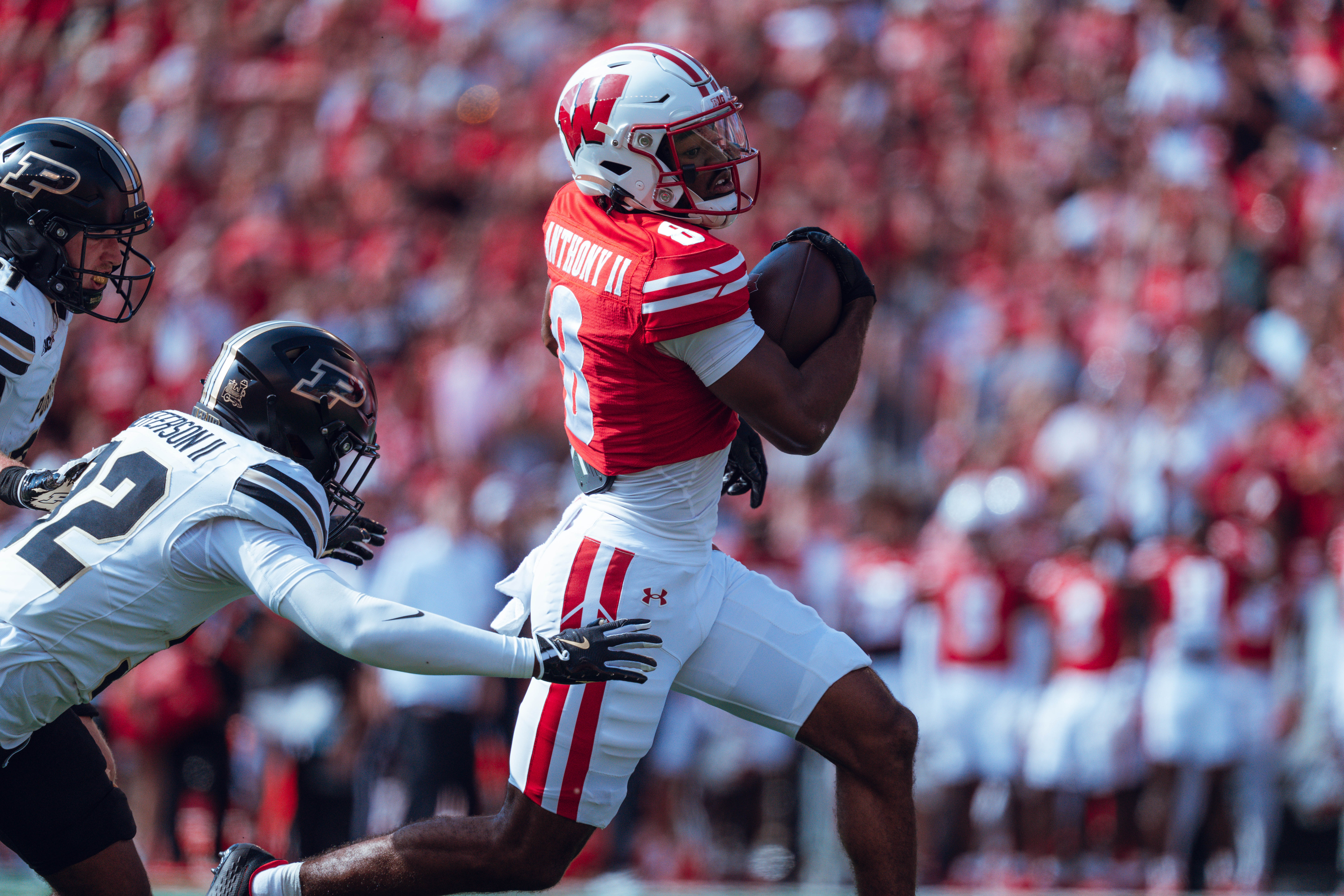 Wisconsin Badgers wide receiver Vinny Anthony II #8 out runs the Purdue Boilermakers for a touchdown at Camp Randall Stadium on October 5, 2024 in Madison, Wisconsin. Photography by Ross Harried for Second Crop Sports.