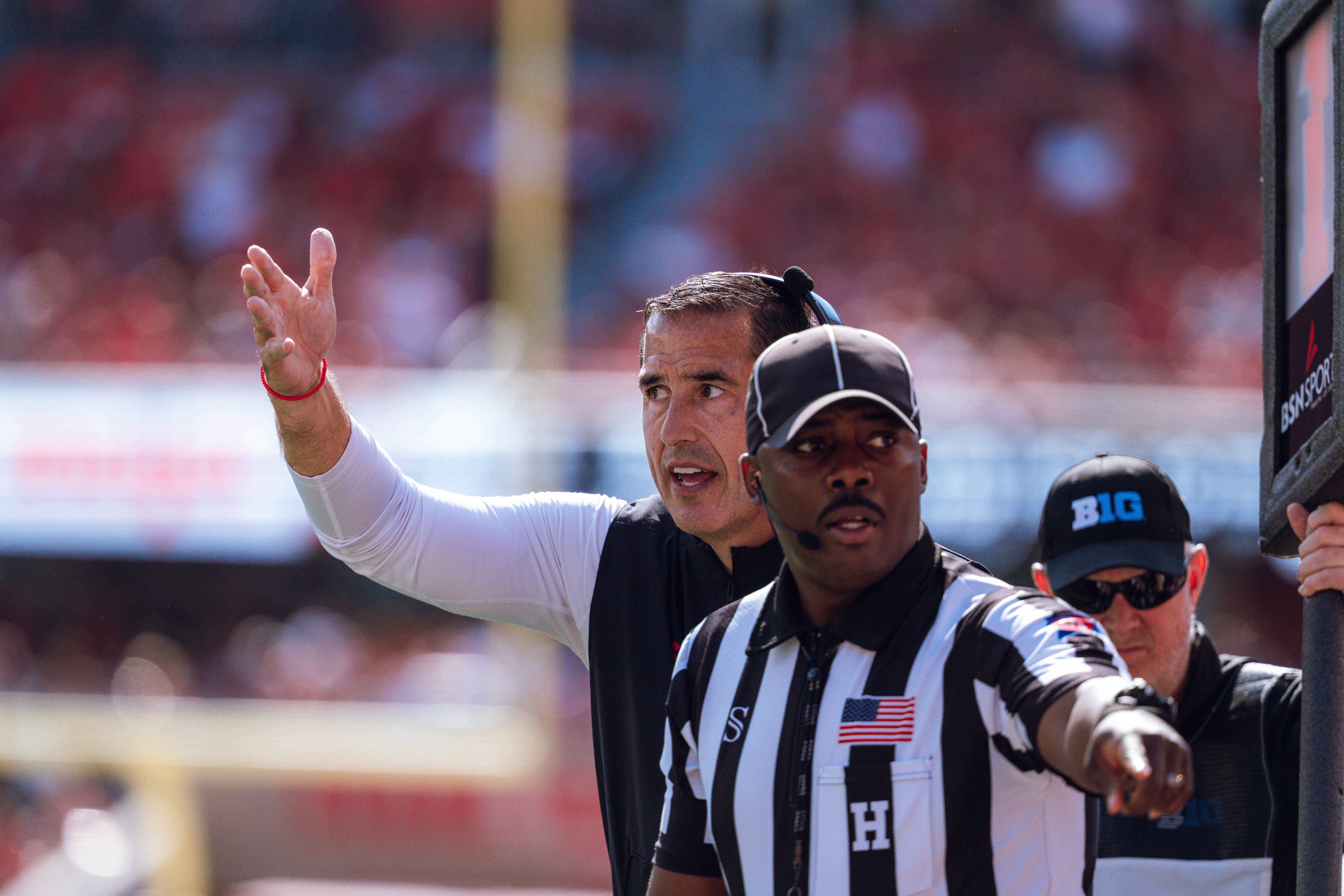 Wisconsin Badgers Head Coach Luke Fickell pleads his case against the Purdue Boilermakers at Camp Randall Stadium on October 5, 2024 in Madison, Wisconsin. Photography by Ross Harried for Second Crop Sports.