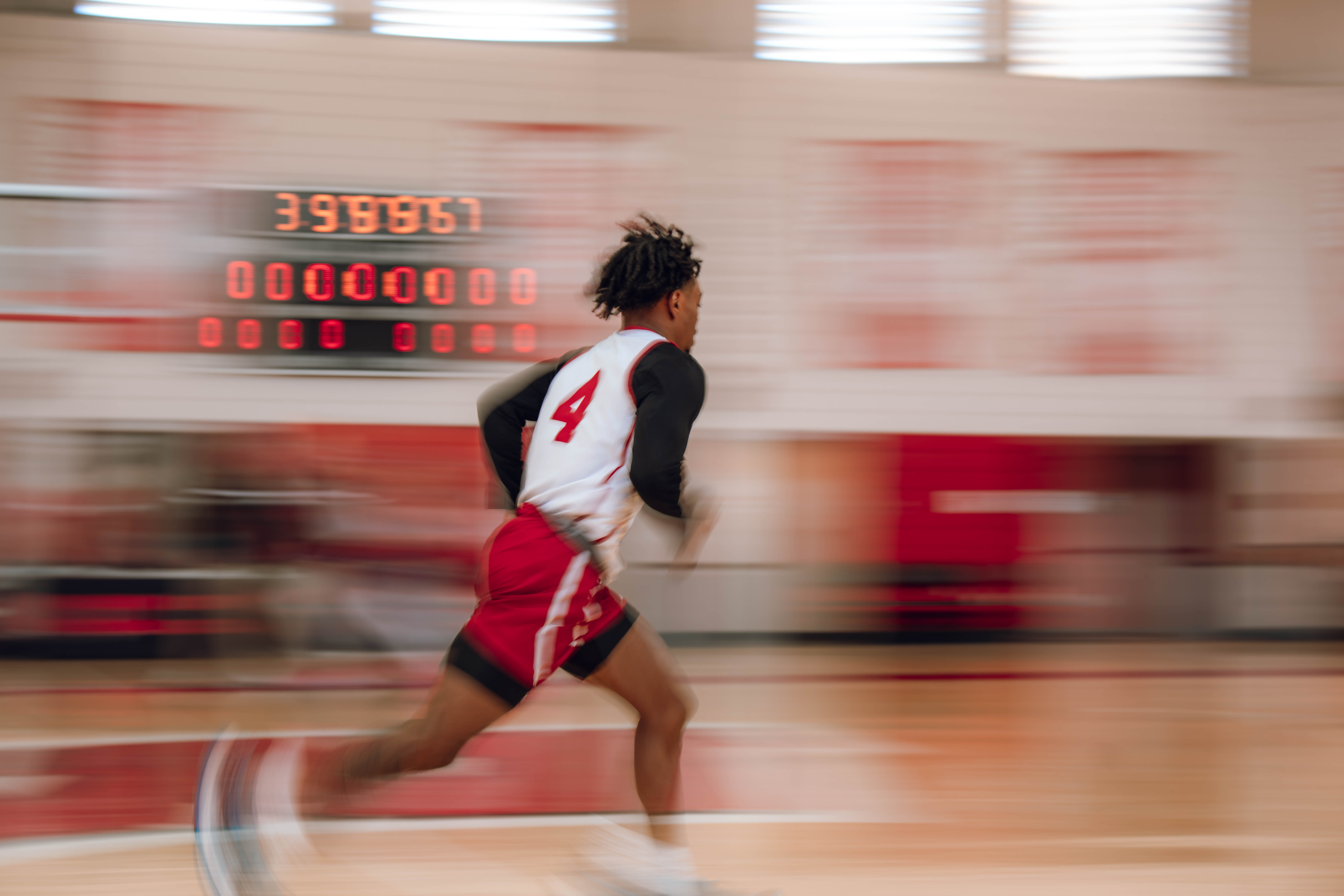 Wisconsin Badgers guard Kamari McGee #4 runs a drill during local media day at the Nicholas Johnson Pavilion on October 7, 2024 in Madison, WI. Photography by Ross Harried for Second Crop Sports.