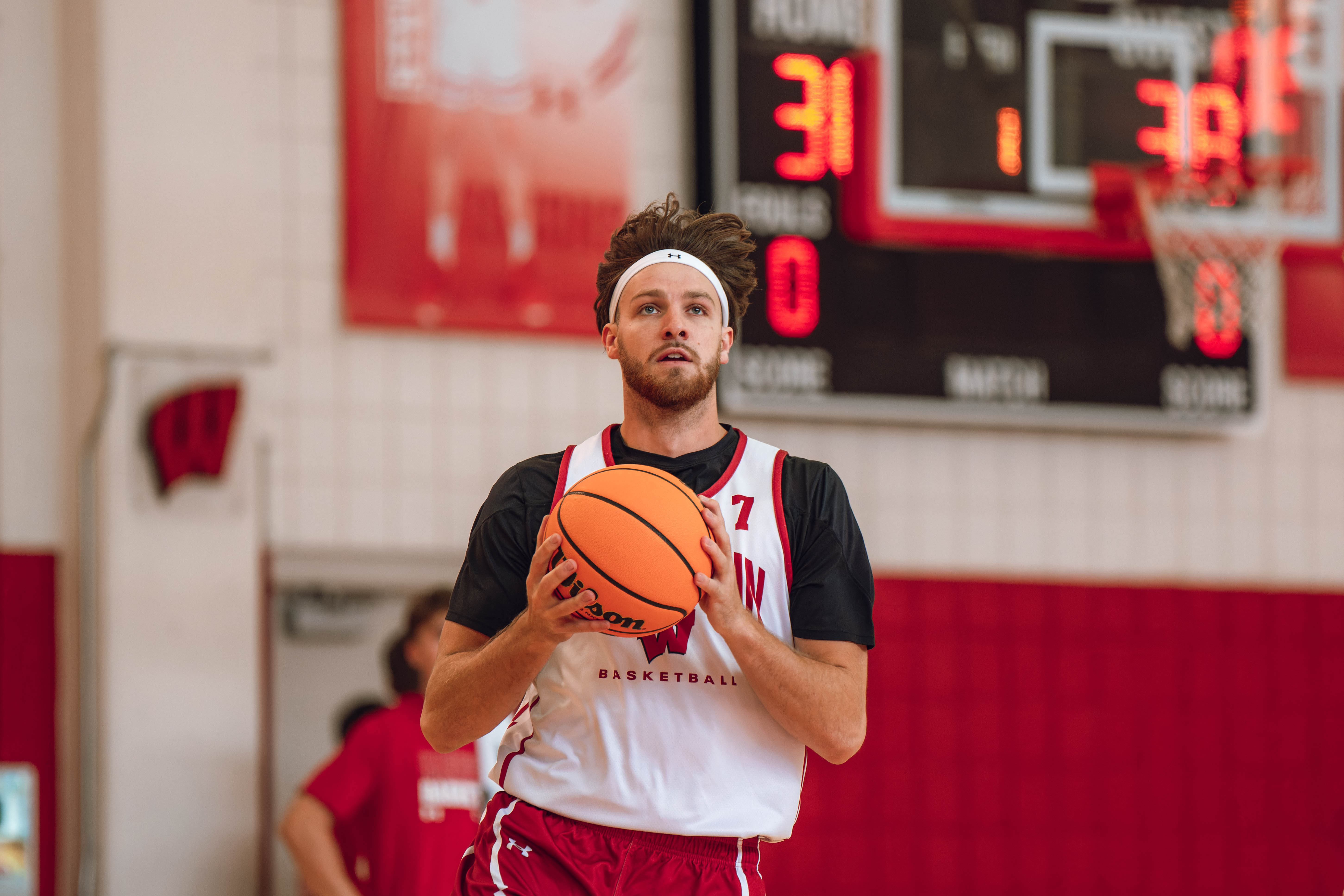 Wisconsin Badgers forward Carter Gilmore #7 goes in for a layup during practice at the Nicholas Johnson Pavilion on October 7, 2024 in Madison, WI. Photography by Ross Harried for Second Crop Sports.