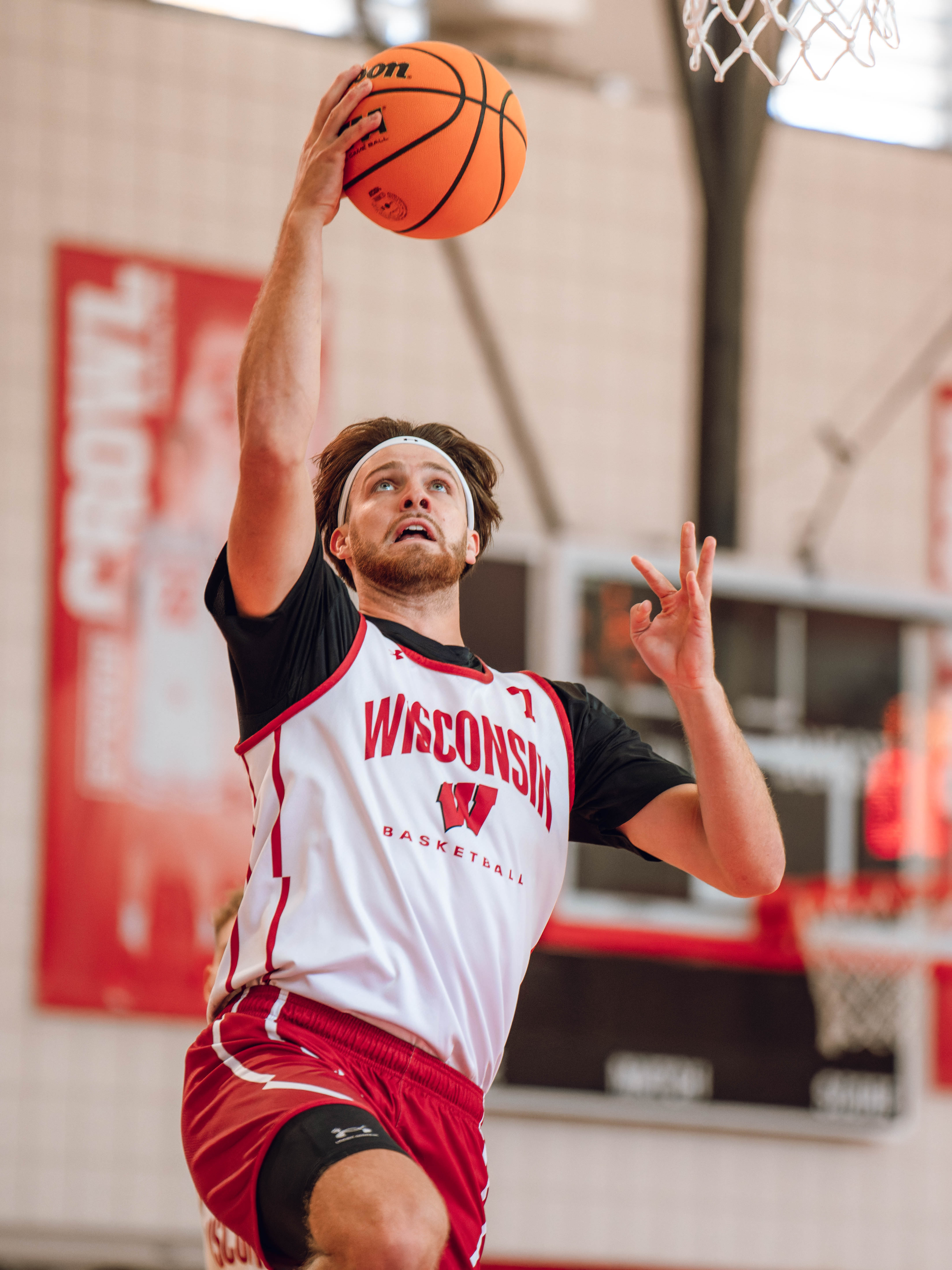 Wisconsin Badgers forward Carter Gilmore #7 goes in for a layup during practice at the Nicholas Johnson Pavilion on October 7, 2024 in Madison, WI. Photography by Ross Harried for Second Crop Sports.