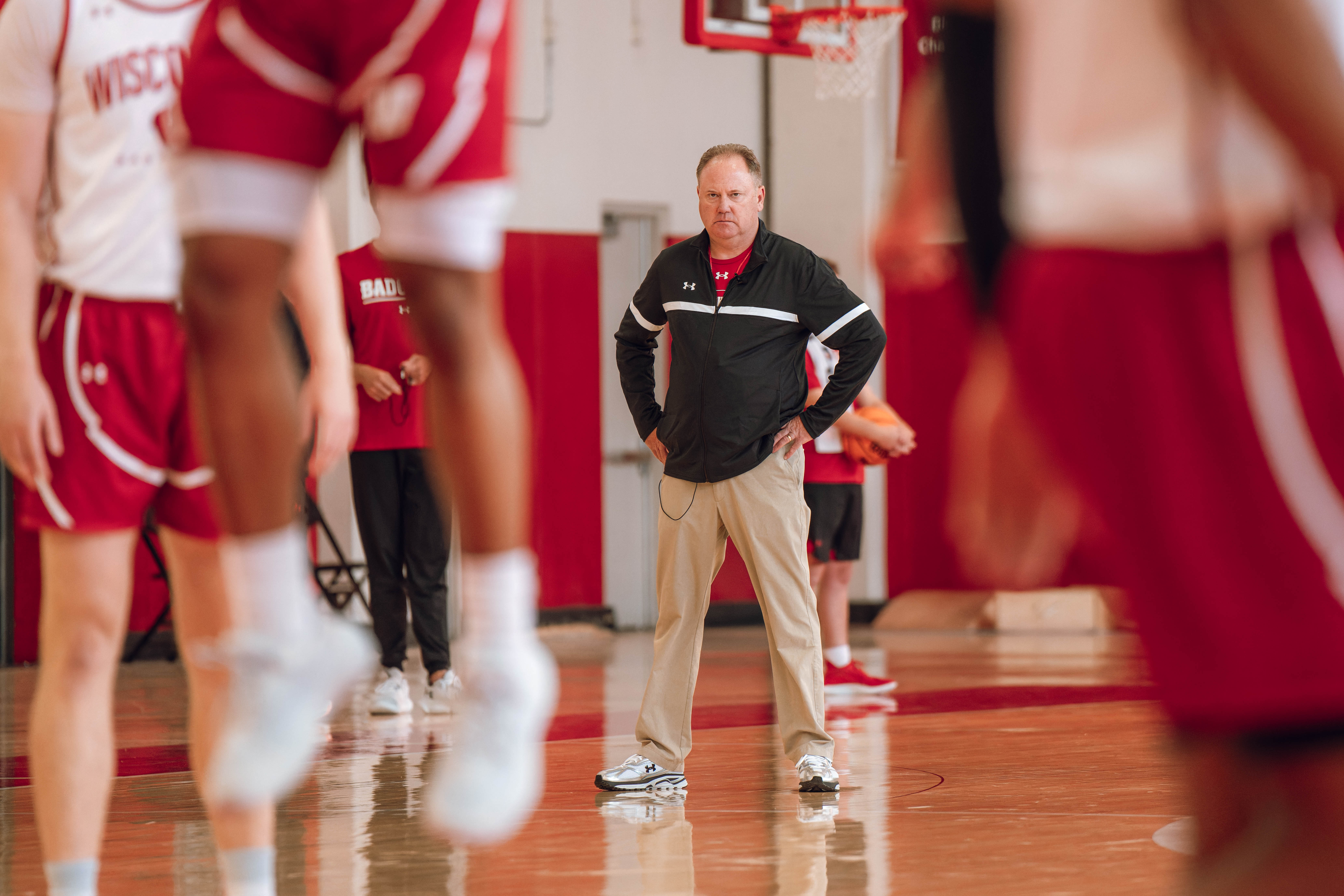 Wisconsin Badgers Head Coach Greg Gard watches over the practice during local media day at the Nicholas Johnson Pavilion on October 7, 2024 in Madison, WI. Photography by Ross Harried for Second Crop Sports.