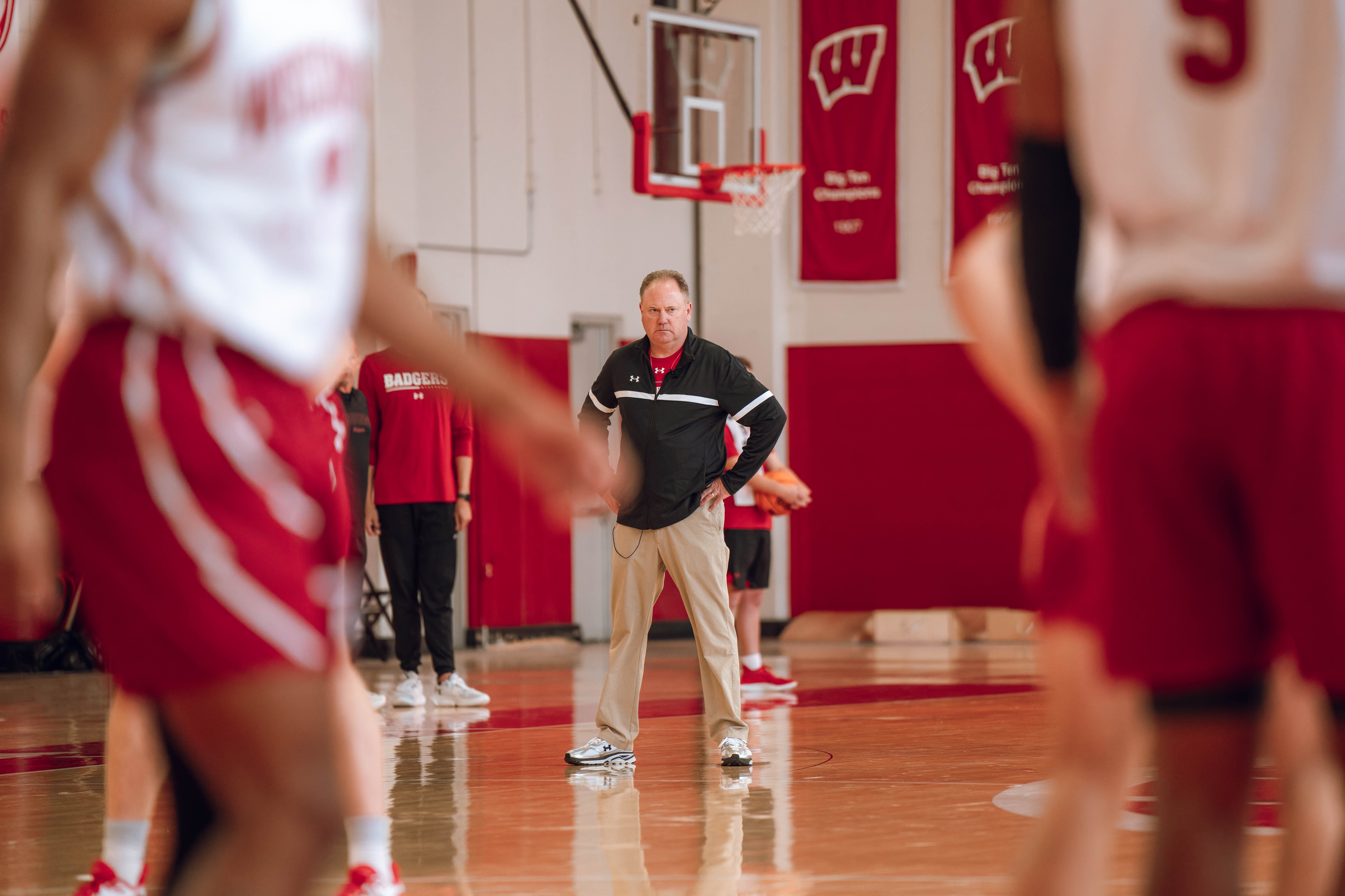 Wisconsin Badgers Head Coach Greg Gard watches over the practice during local media day at the Nicholas Johnson Pavilion on October 7, 2024 in Madison, WI. Photography by Ross Harried for Second Crop Sports.