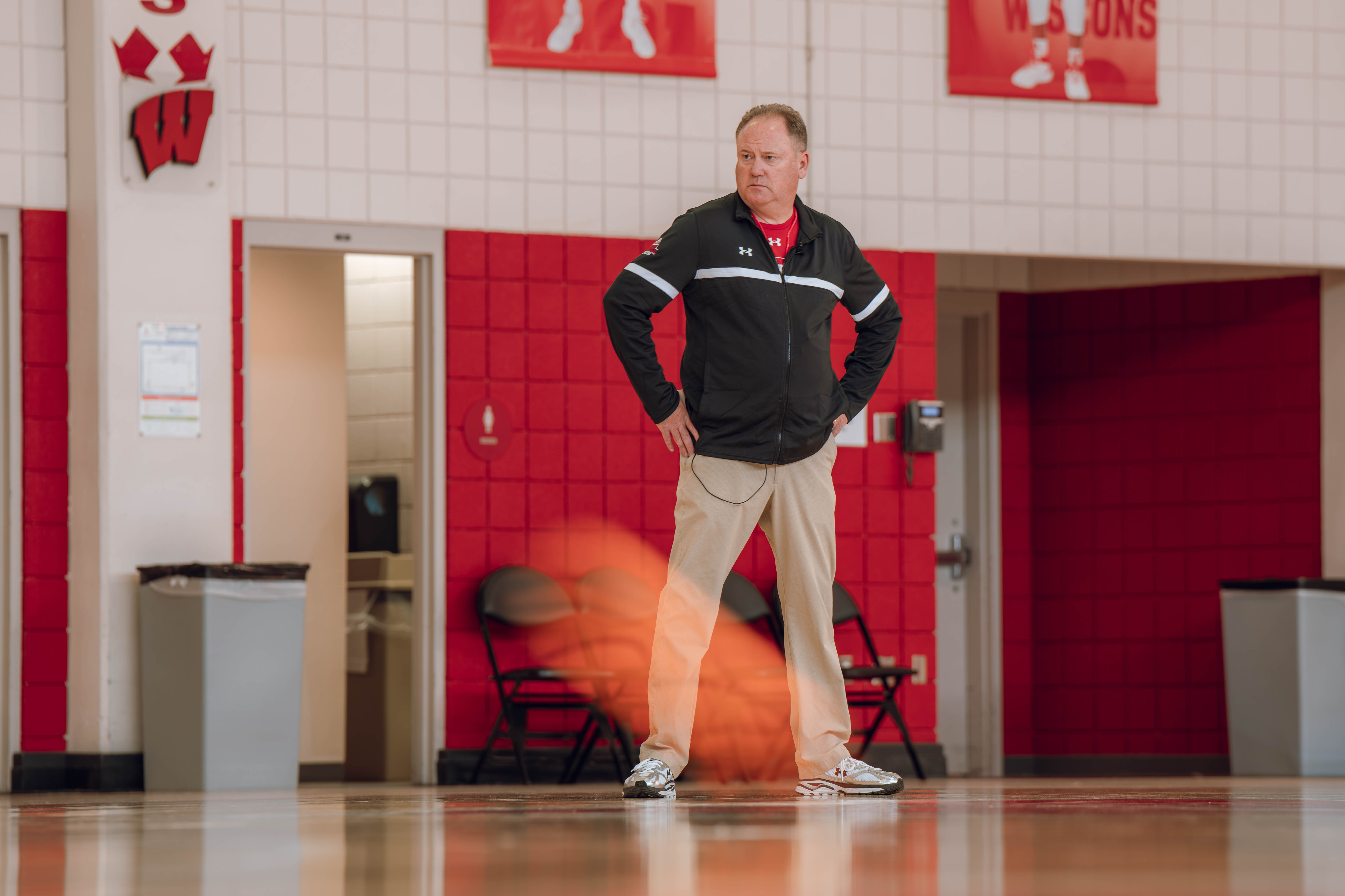 Wisconsin Badgers Head Coach Greg Gard watches over the practice during local media day at the Nicholas Johnson Pavilion on October 7, 2024 in Madison, WI. Photography by Ross Harried for Second Crop Sports.