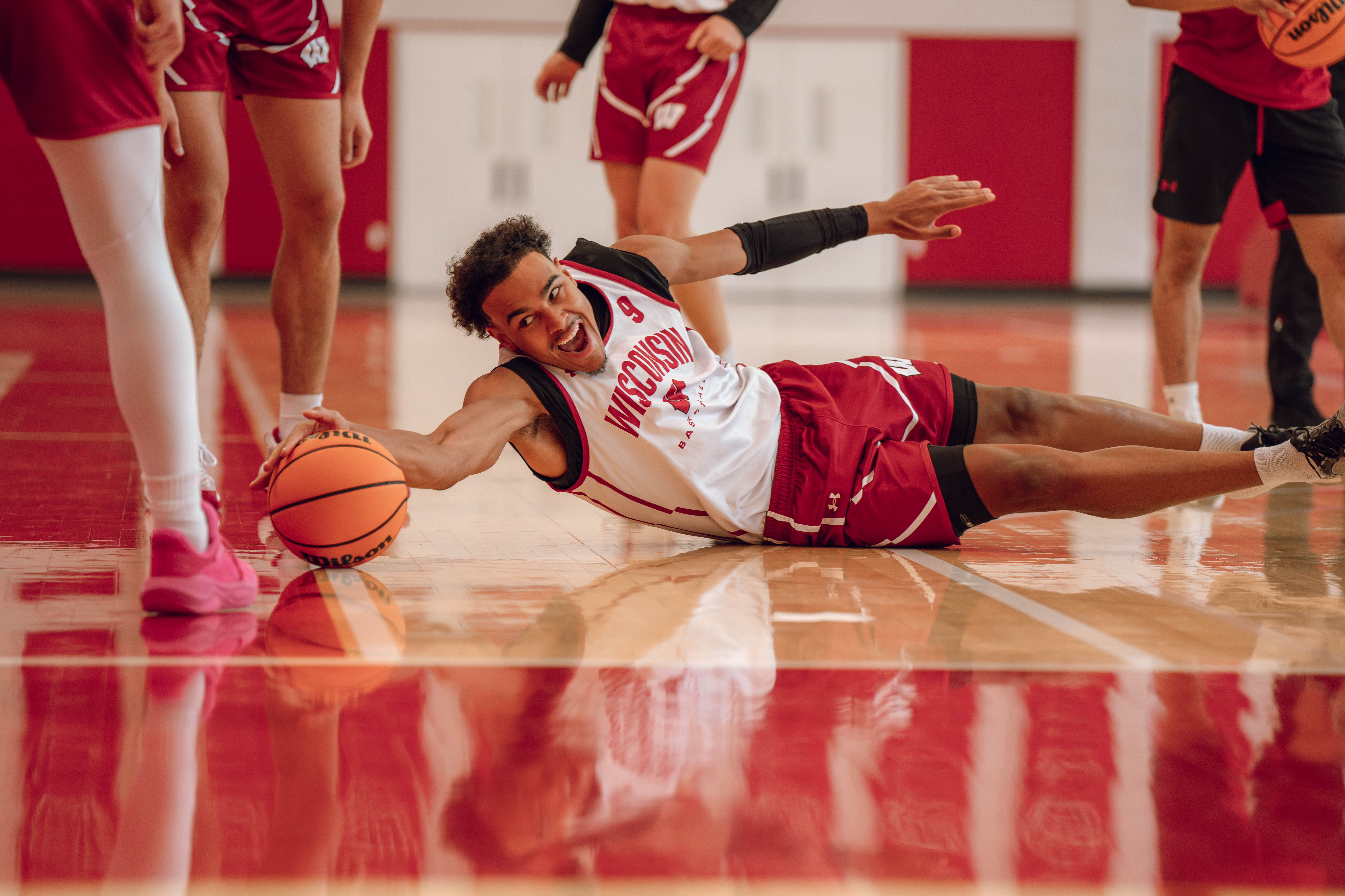 Wisconsin Badgers guard John Tonje #9 dives after a loose ball during practice at the Nicholas Johnson Pavilion on October 7, 2024 in Madison, WI. Photography by Ross Harried for Second Crop Sports.