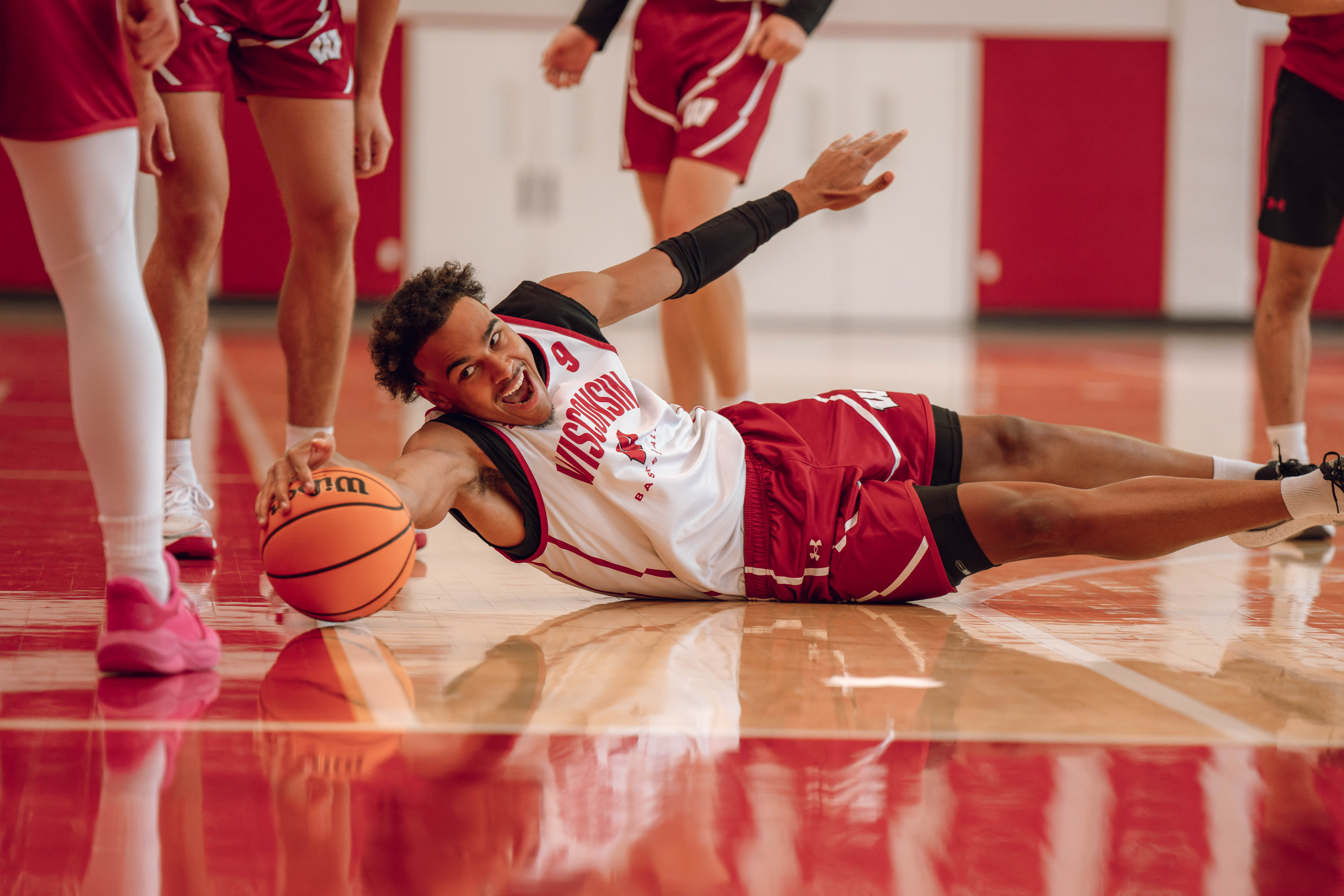 Wisconsin Badgers guard John Tonje #9 dives after a loose ball during practice at the Nicholas Johnson Pavilion on October 7, 2024 in Madison, WI. Photography by Ross Harried for Second Crop Sports.