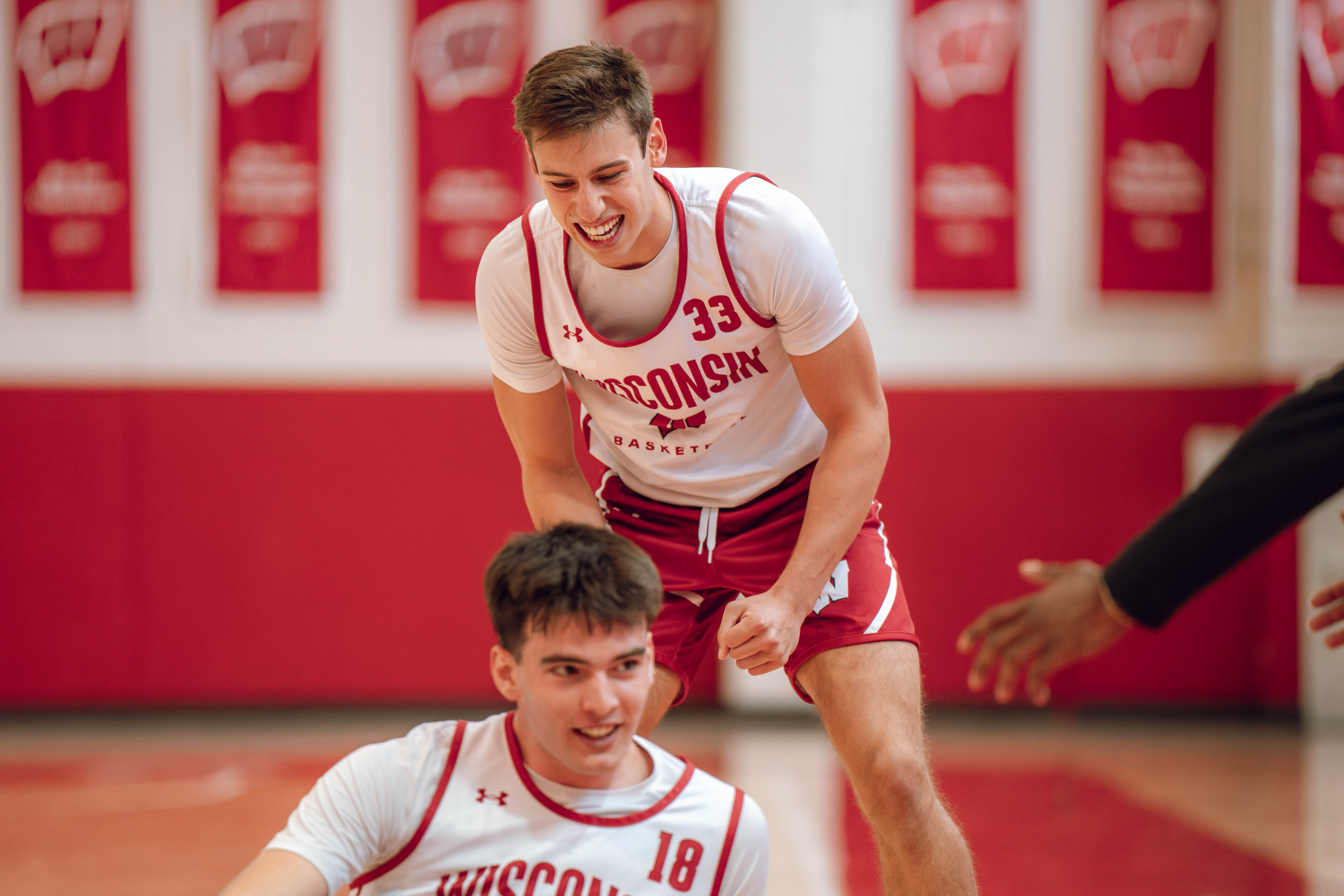 Wisconsin Badgers guard Jack Janicki #33 looks after forward Riccardo Greppi #18 during practice at the Nicholas Johnson Pavilion on October 7, 2024 in Madison, WI. Photography by Ross Harried for Second Crop Sports.