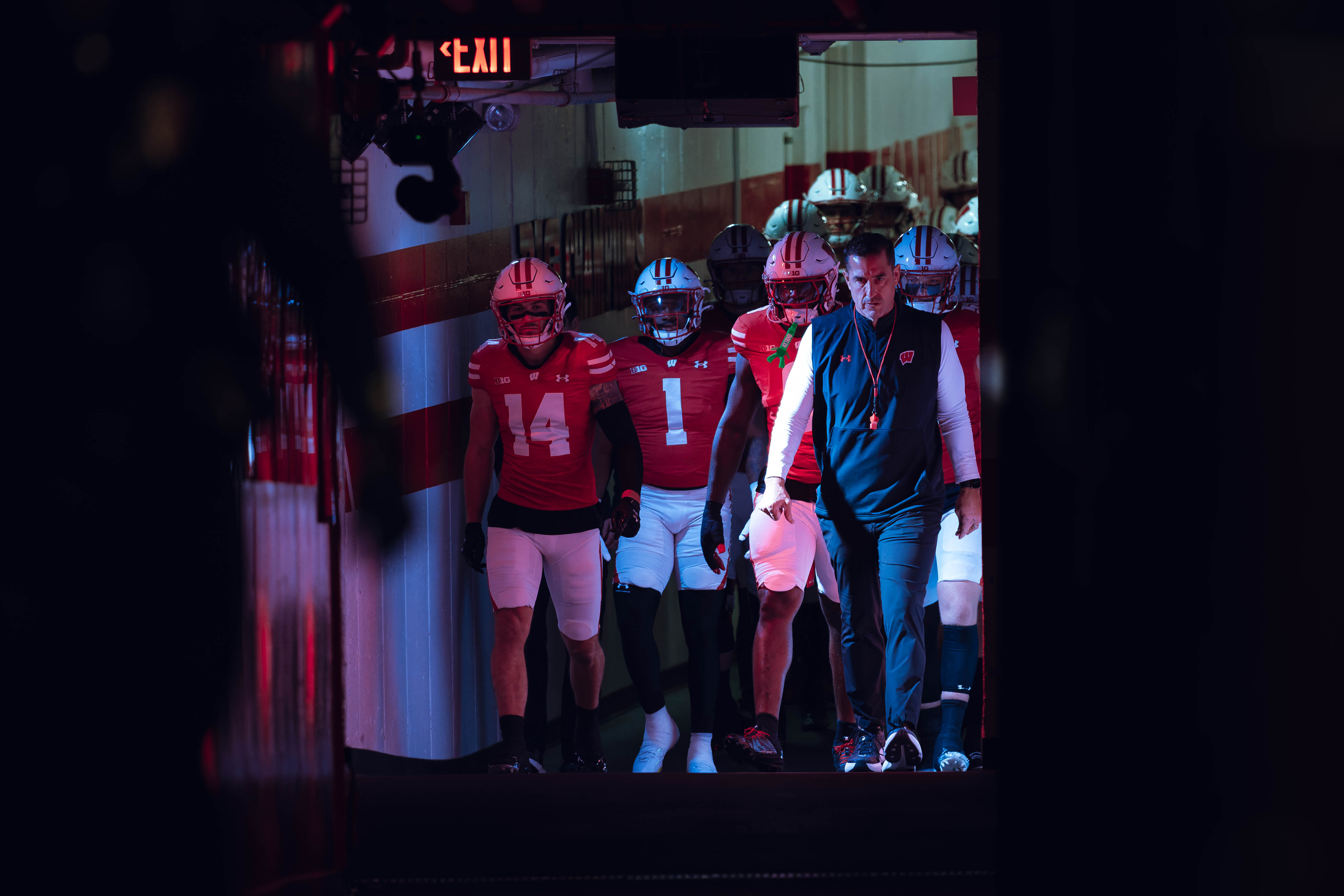 Wisconsin Badgers Head Coach Luke Fickell leads Wisconsin out of the tunnel at Camp Randall Stadium as they take on the Oregon Ducks on November 16, 2024 in Madison, Wisconsin. Photography by Ross Harried for Second Crop Sports.