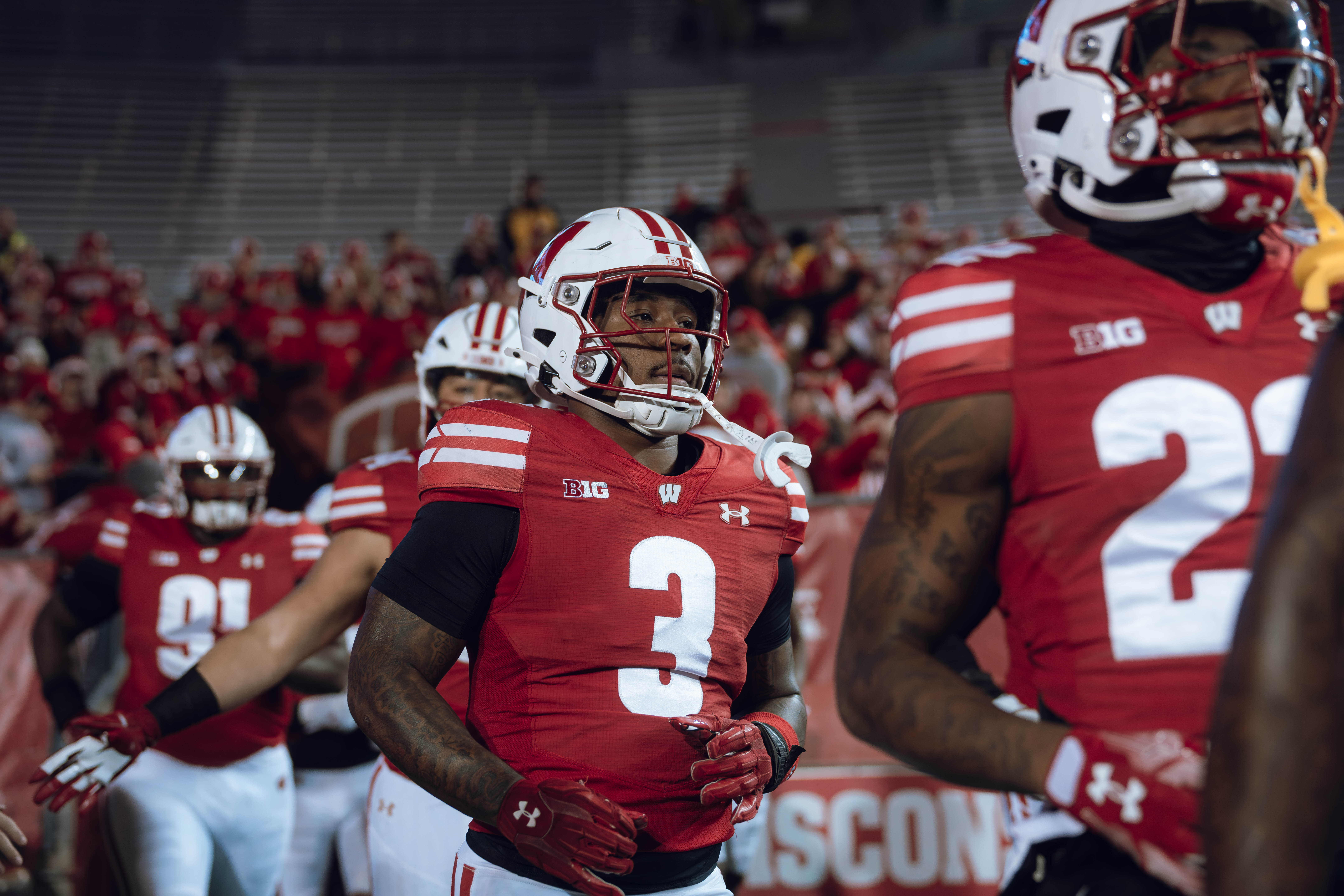 Wisconsin Badgers running back Tawee Walker #3 runs out of the tunnel at Camp Randall Stadium against the Oregon Ducks on November 16, 2024 in Madison, Wisconsin. Photography by Ross Harried for Second Crop Sports.