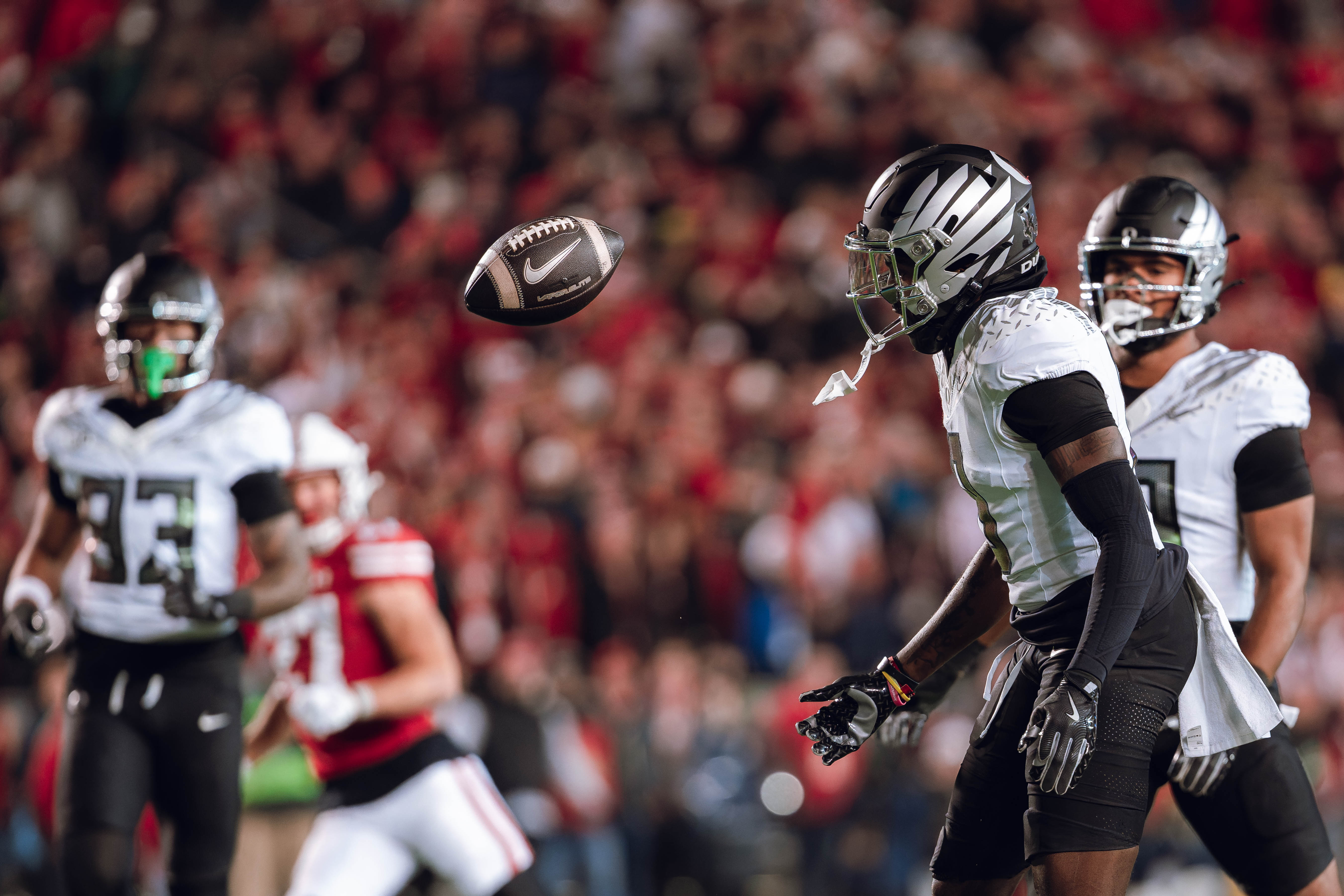 Oregon defensive back Dontae Manning #8 eyes a punt against the Wisconsin Badgers at Camp Randall Stadium on November 16, 2024 in Madison, Wisconsin. Photography by Ross Harried for Second Crop Sports.