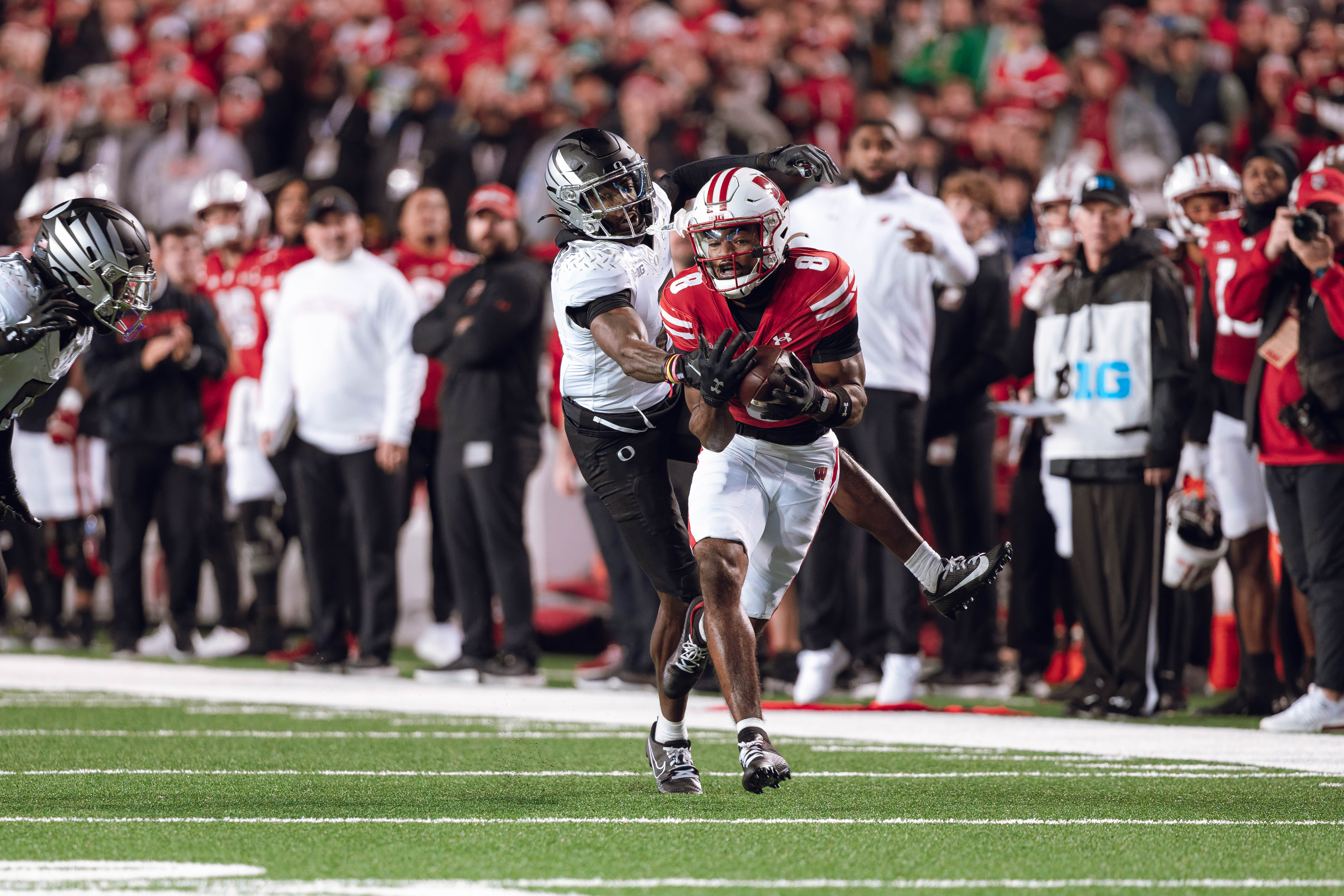 Wisconsin Badgers wide receiver Vinny Anthony II #8 hauls in a long pass against the Oregon Ducks at Camp Randall Stadium on November 16, 2024 in Madison, Wisconsin. Photography by Ross Harried for Second Crop Sports.