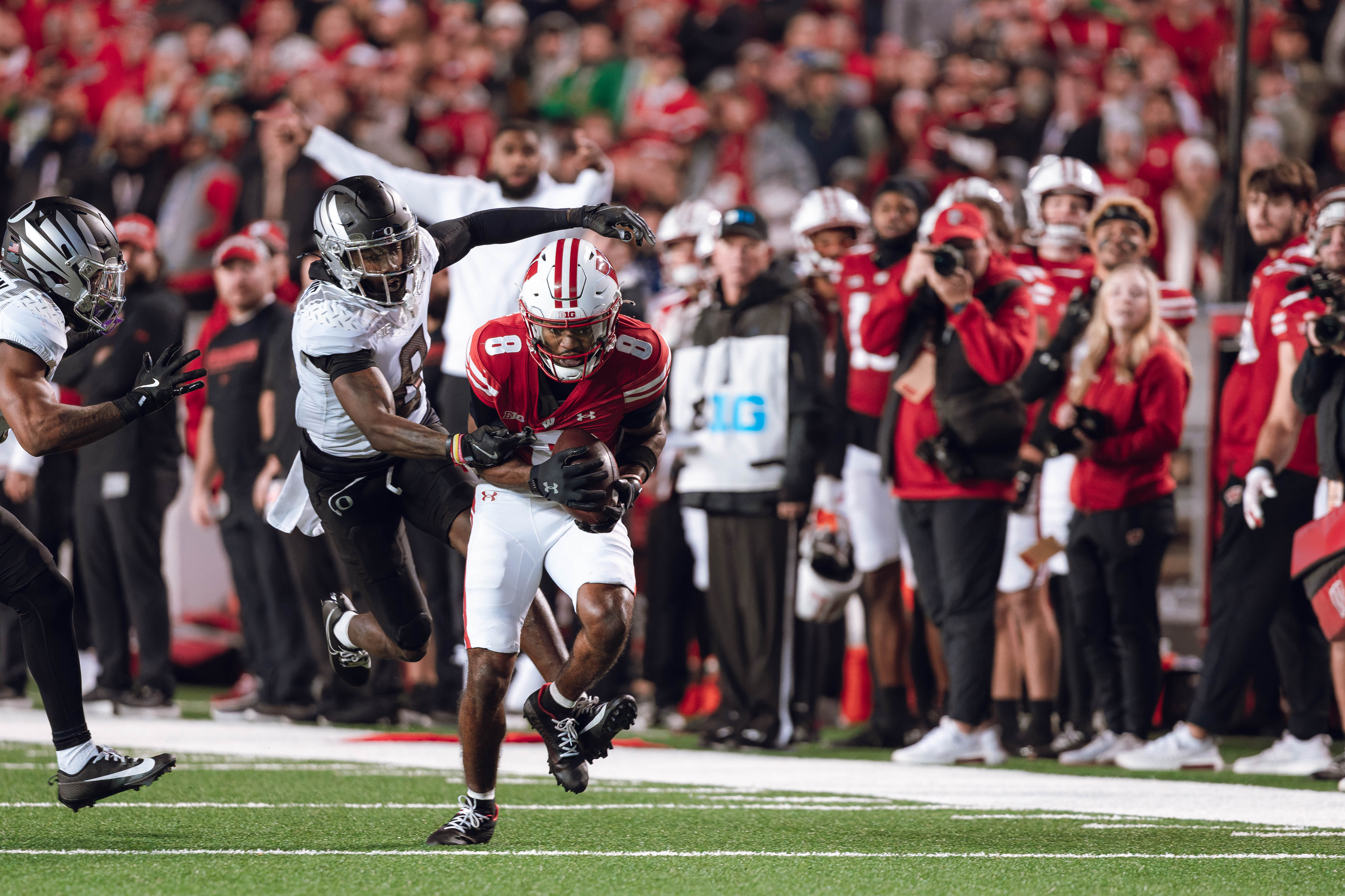 Wisconsin Badgers wide receiver Vinny Anthony II #8 hauls in a long pass against the Oregon Ducks at Camp Randall Stadium on November 16, 2024 in Madison, Wisconsin. Photography by Ross Harried for Second Crop Sports.