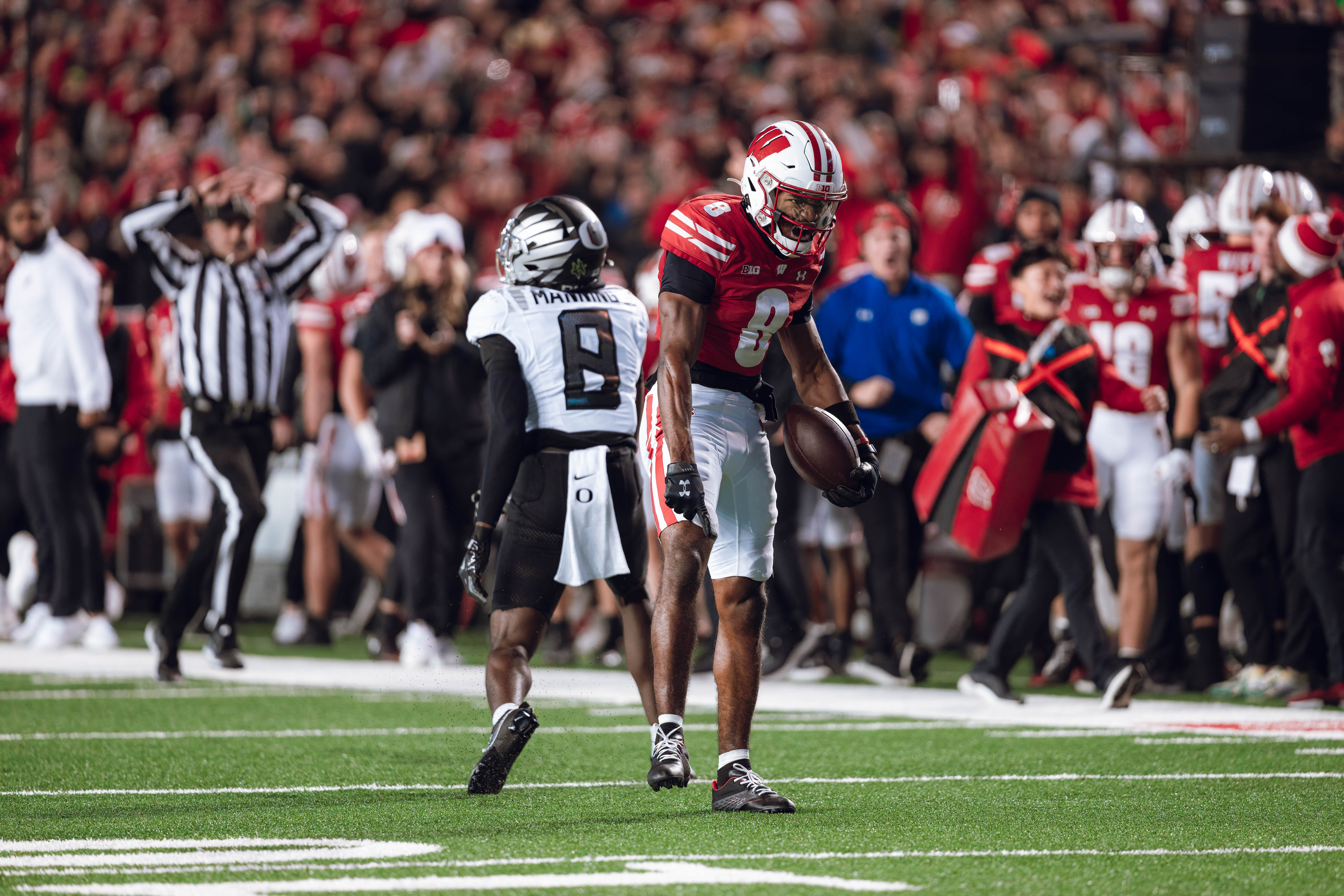 Wisconsin Badgers wide receiver Vinny Anthony II #8 hauls in a long pass against the Oregon Ducks at Camp Randall Stadium on November 16, 2024 in Madison, Wisconsin. Photography by Ross Harried for Second Crop Sports.