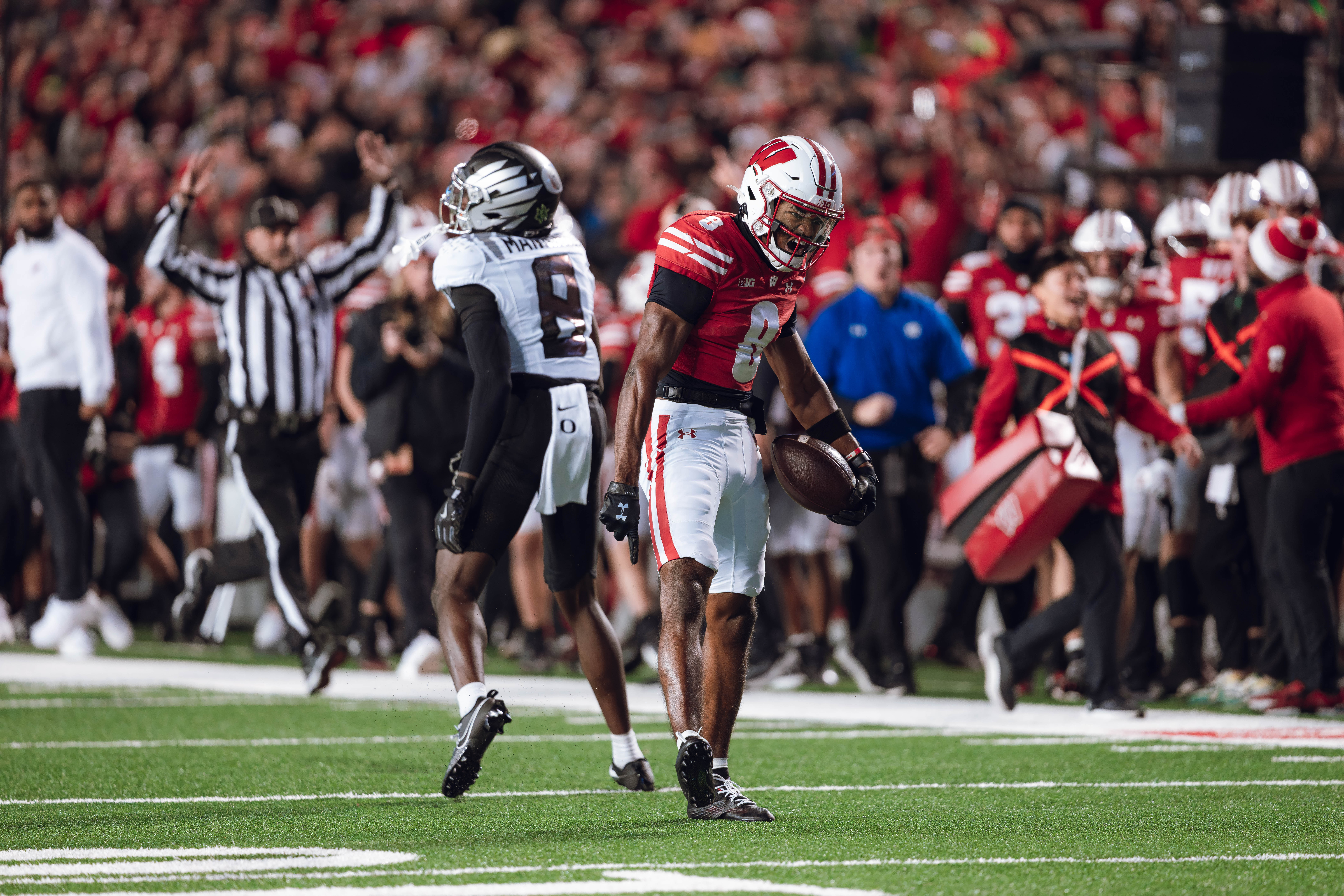 Wisconsin Badgers wide receiver Vinny Anthony II #8 hauls in a long pass against the Oregon Ducks at Camp Randall Stadium on November 16, 2024 in Madison, Wisconsin. Photography by Ross Harried for Second Crop Sports.