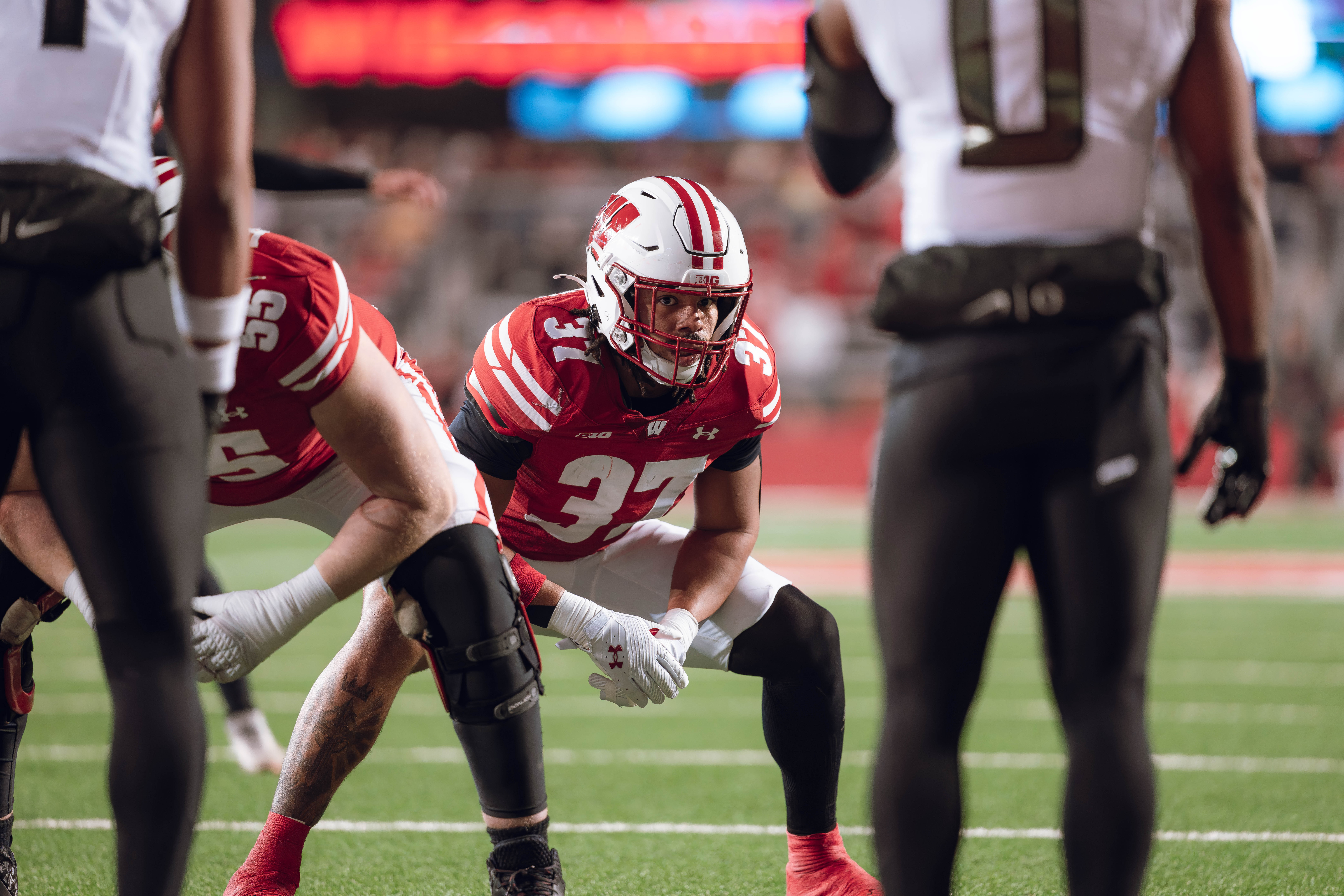 Wisconsin Badgers tight end Riley Nowakowski #37 eyes up the Oregon Ducks defense before an extra point attempt at Camp Randall Stadium on November 16, 2024 in Madison, Wisconsin. Photography by Ross Harried for Second Crop Sports.