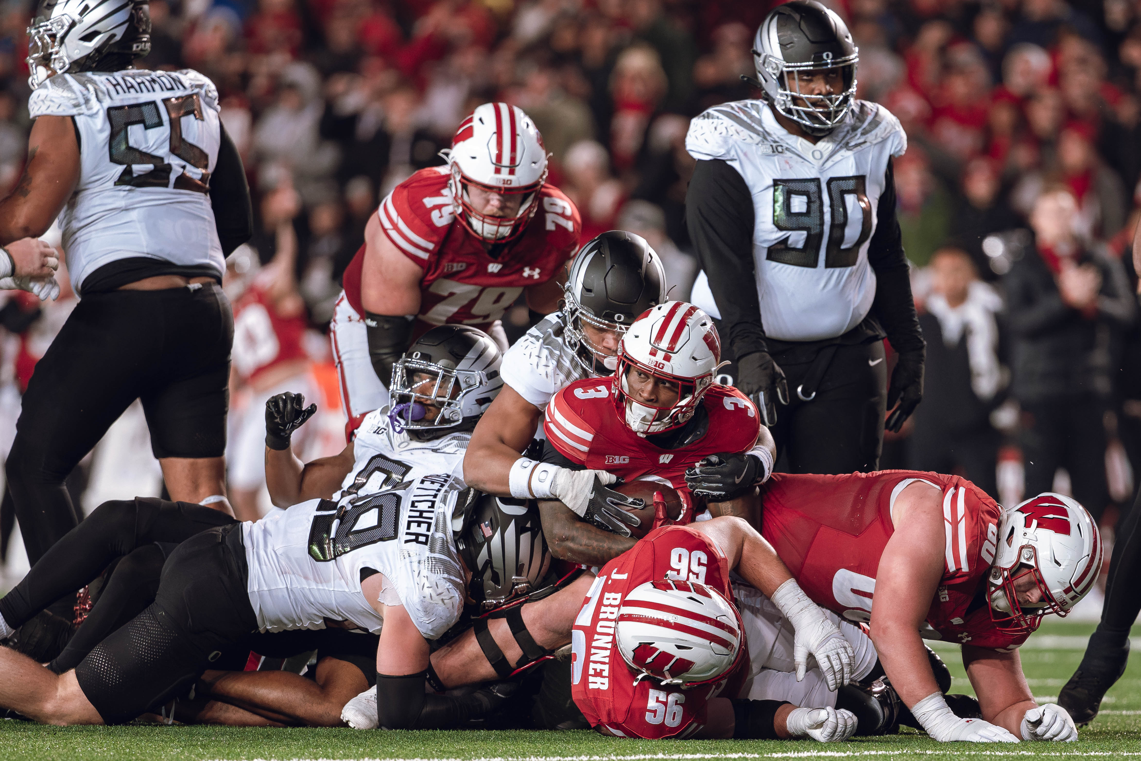 Wisconsin Badgers running back Tawee Walker #3 looks towards the 4th down marker against the Oregon Ducks defense at Camp Randall Stadium on November 16, 2024 in Madison, Wisconsin. Photography by Ross Harried for Second Crop Sports.