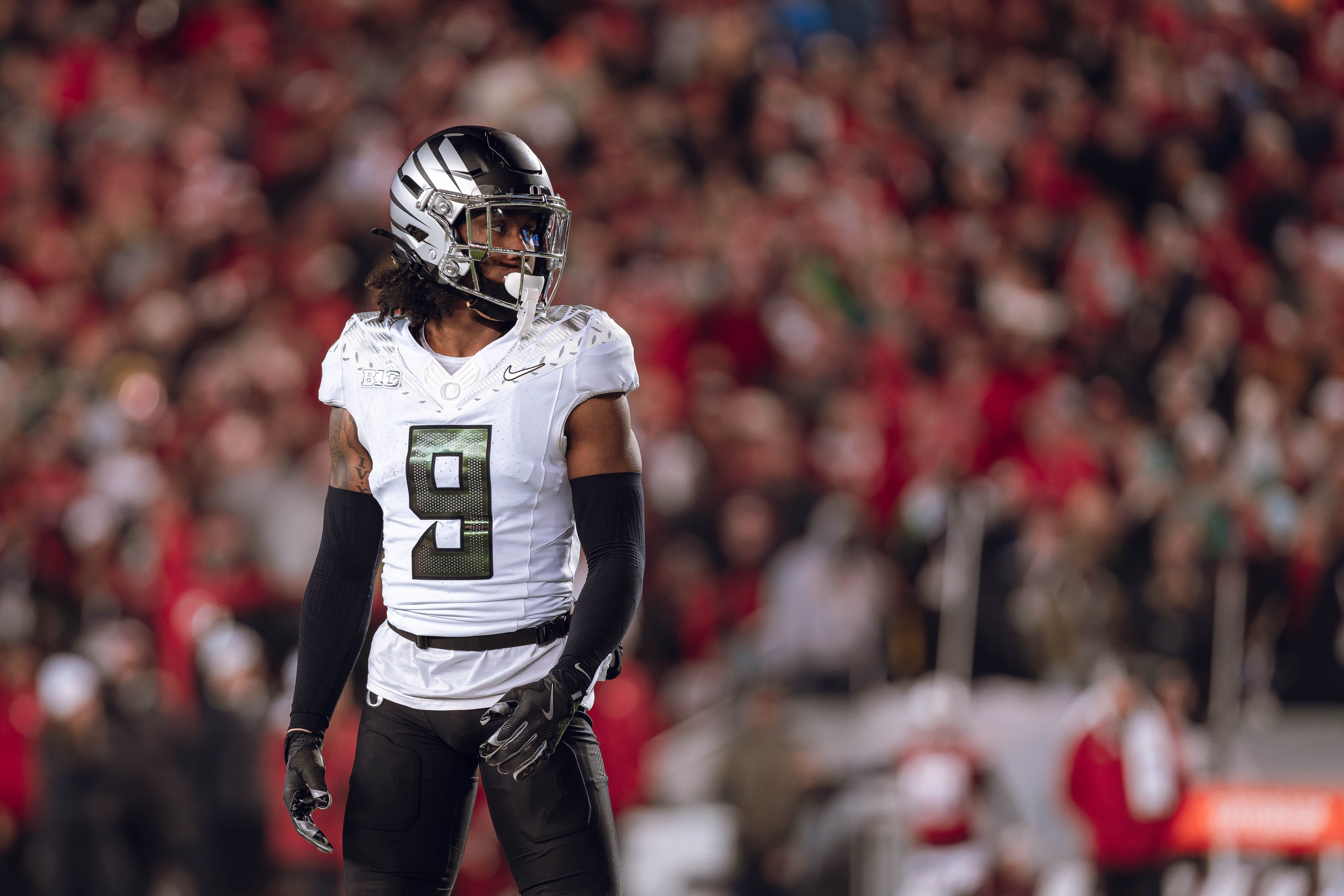 Oregon defensive back Nikko Reed #9 reads the Wisconsin Badgers offense at Camp Randall Stadium on November 16, 2024 in Madison, Wisconsin. Photography by Ross Harried for Second Crop Sports.