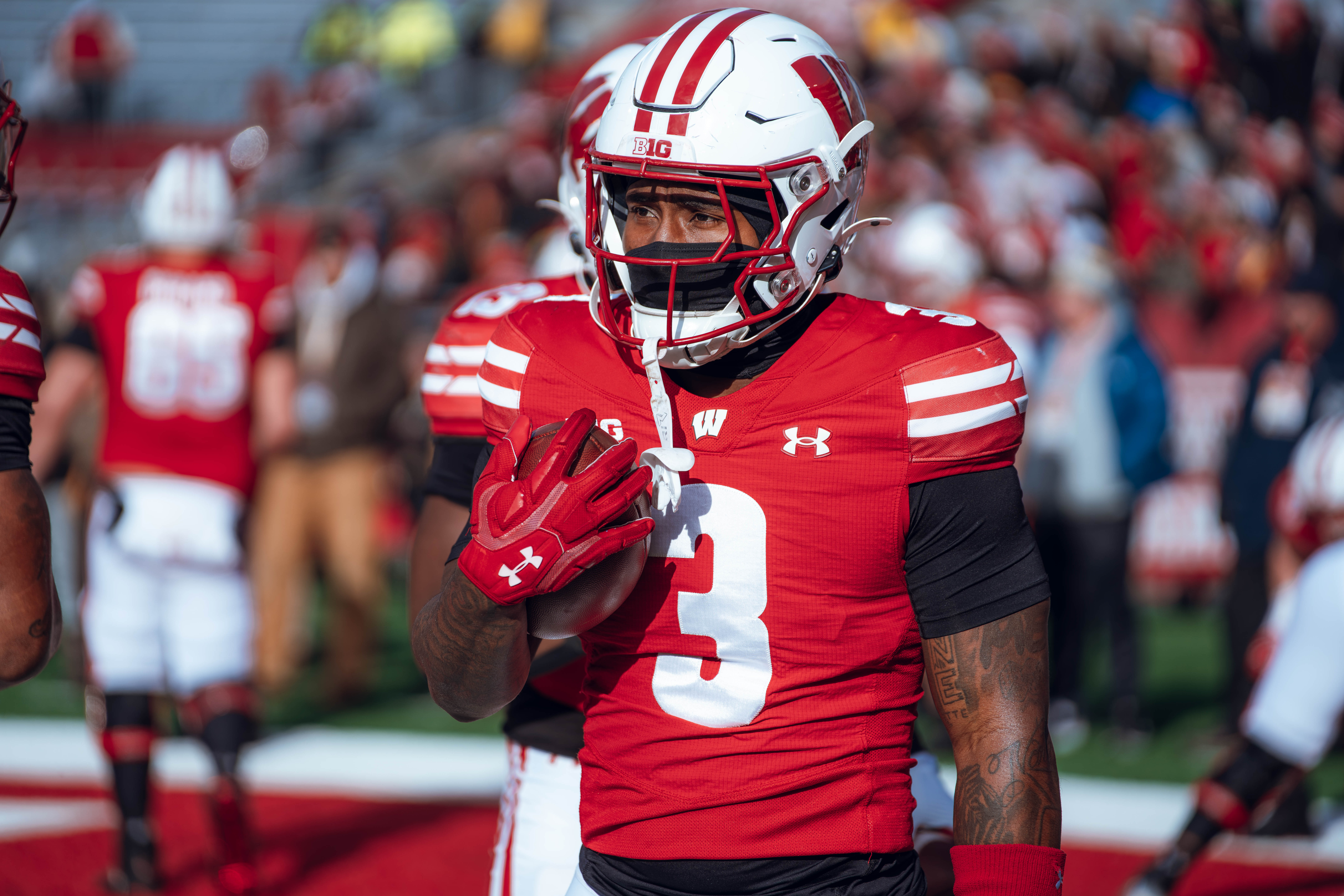 Wisconsin Badgers running back Tawee Walker #3 warms up as the Wisconsin Badgers take on the Minnesota Golden Gophers at Camp Randall Stadium on November 29, 2024 in Madison, Wisconsin. Photography by Ross Harried for Second Crop Sports.