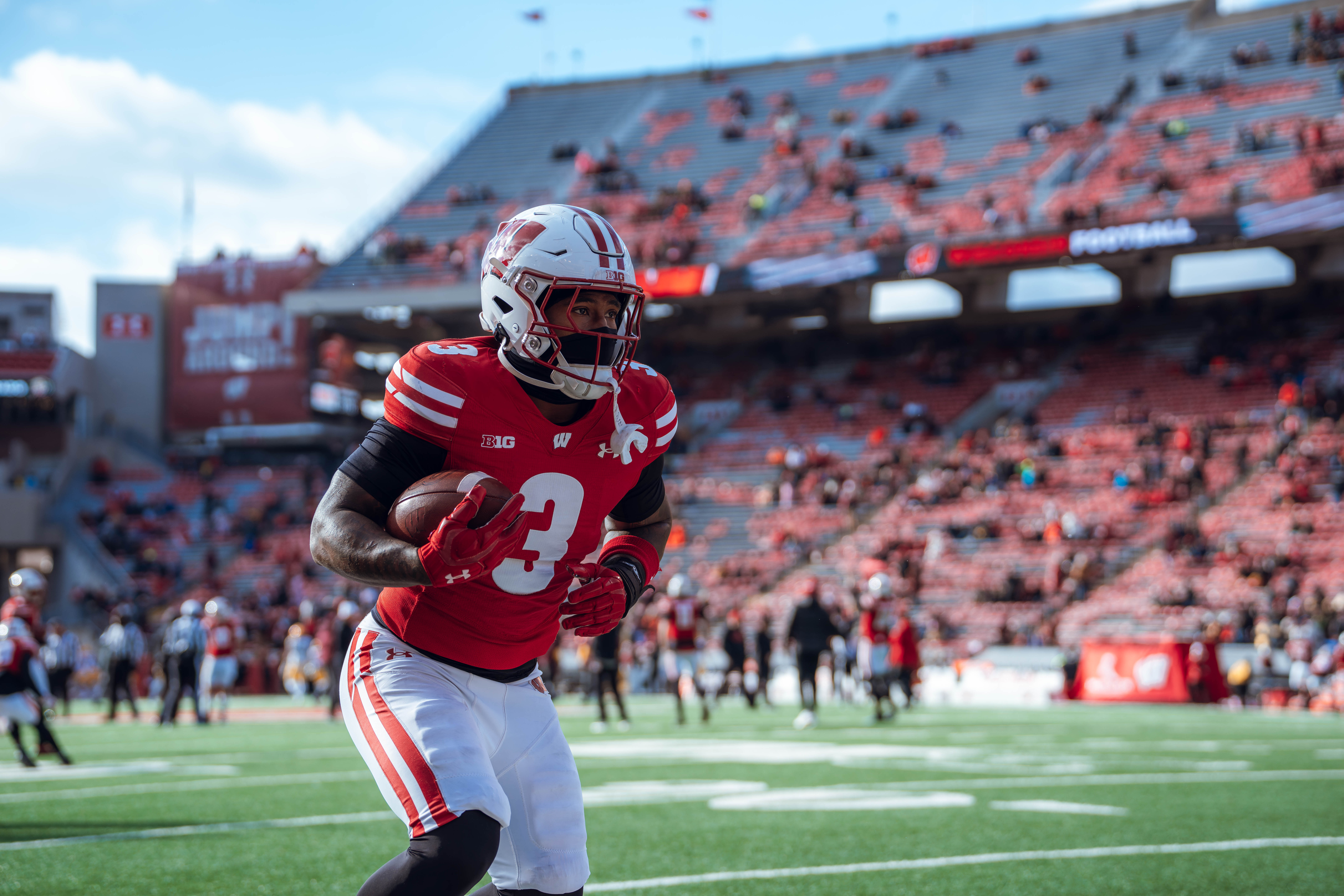 Wisconsin Badgers running back Tawee Walker #3 warms up as the Wisconsin Badgers take on the Minnesota Golden Gophers at Camp Randall Stadium on November 29, 2024 in Madison, Wisconsin. Photography by Ross Harried for Second Crop Sports.