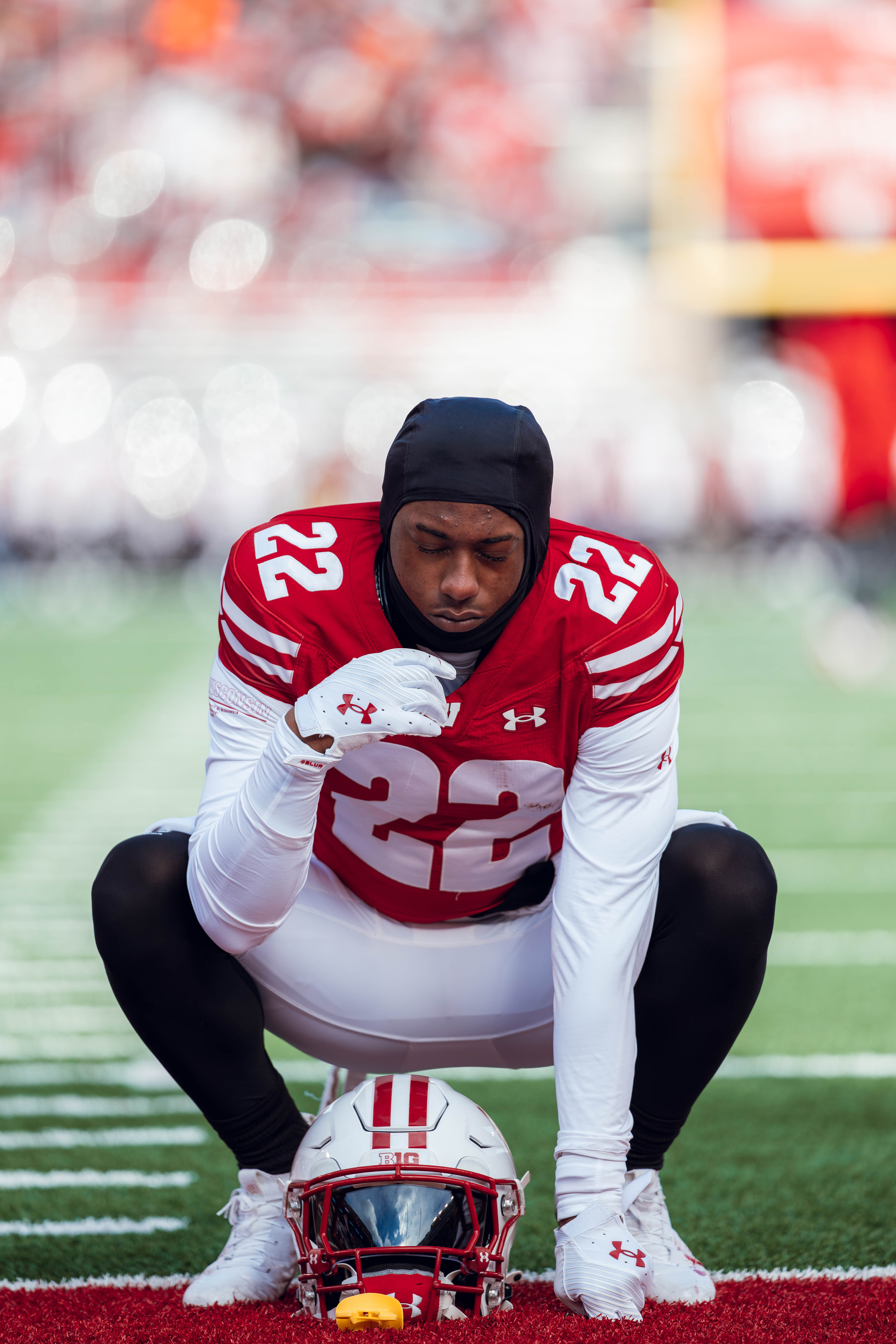 Wisconsin Badgers wide receiver Kyan Berry-Johnson #22 gets ready before the Wisconsin Badgers take on the Minnesota Golden Gophers at Camp Randall Stadium on November 29, 2024 in Madison, Wisconsin. Photography by Ross Harried for Second Crop Sports.