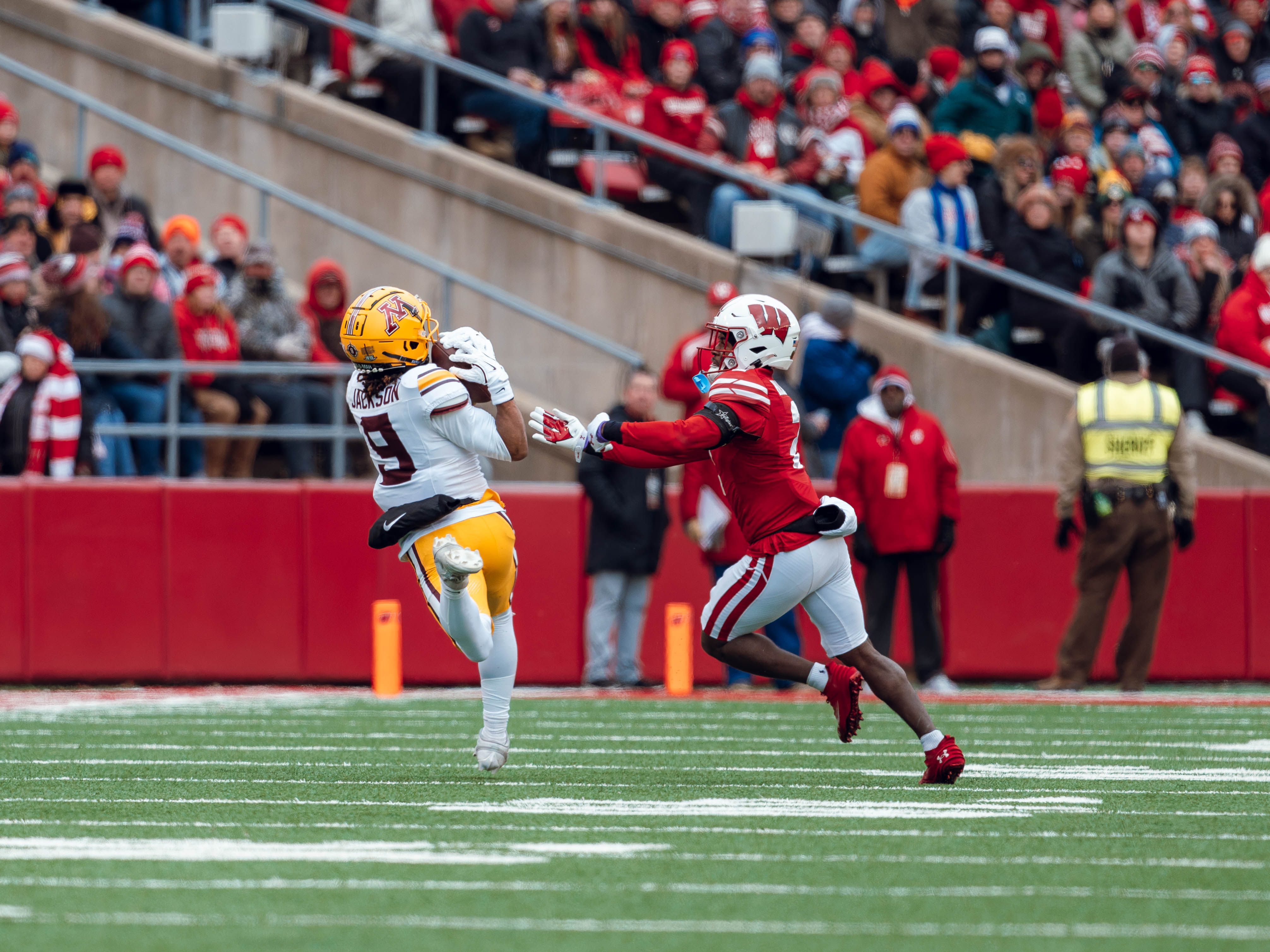 Minnesota Golden Gopher wide receiver Daniel Jackson #9 hauls in a deep pass against the Wisconsin Badgers at Camp Randall Stadium on November 29, 2024 in Madison, Wisconsin. Photography by Ross Harried for Second Crop Sports.