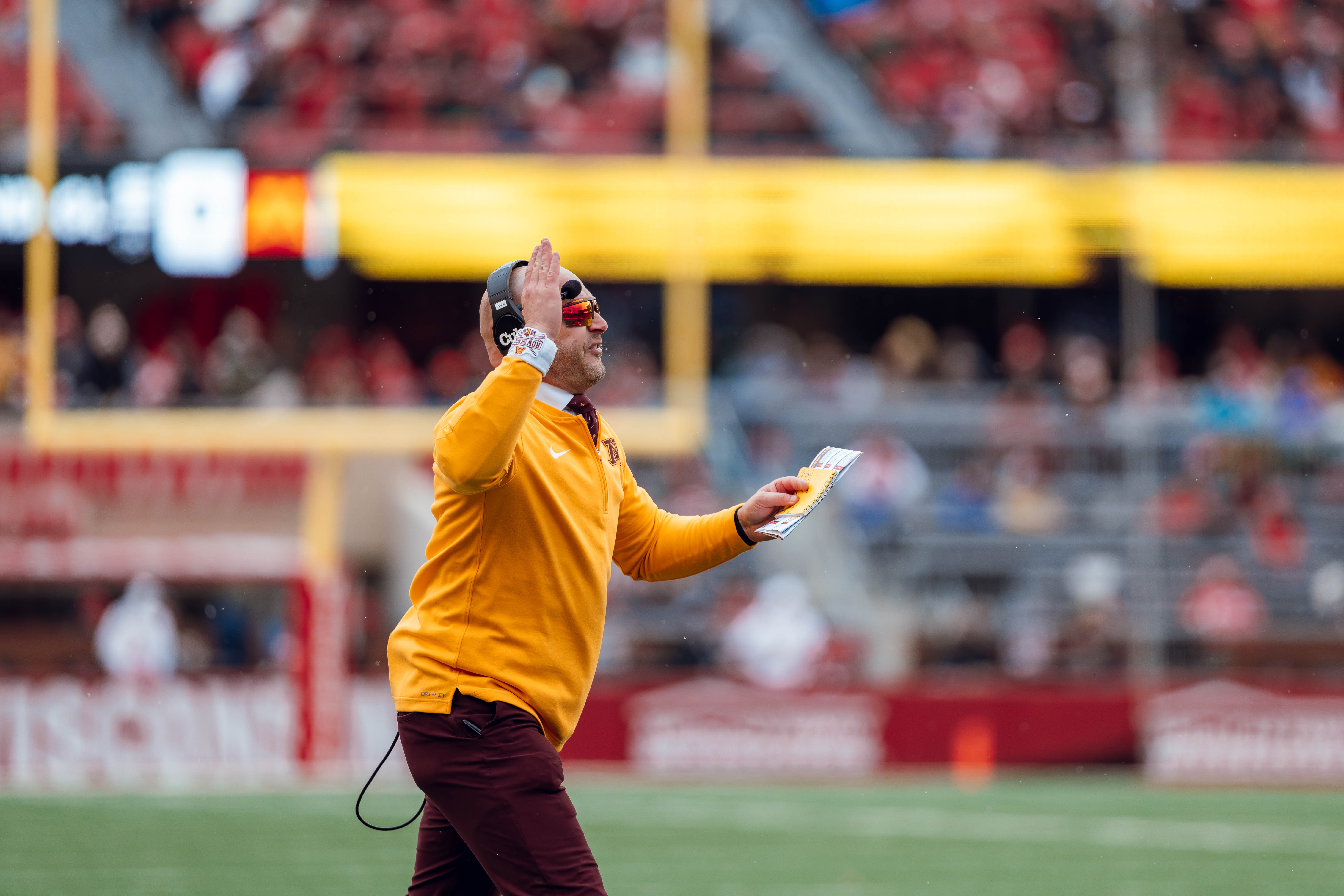 Minnesota head coach P.J. Fleck looks on as his Golden Gophers take on the Wisconsin Badgers at Camp Randall Stadium on November 29, 2024 in Madison, Wisconsin. Photography by Ross Harried for Second Crop Sports.