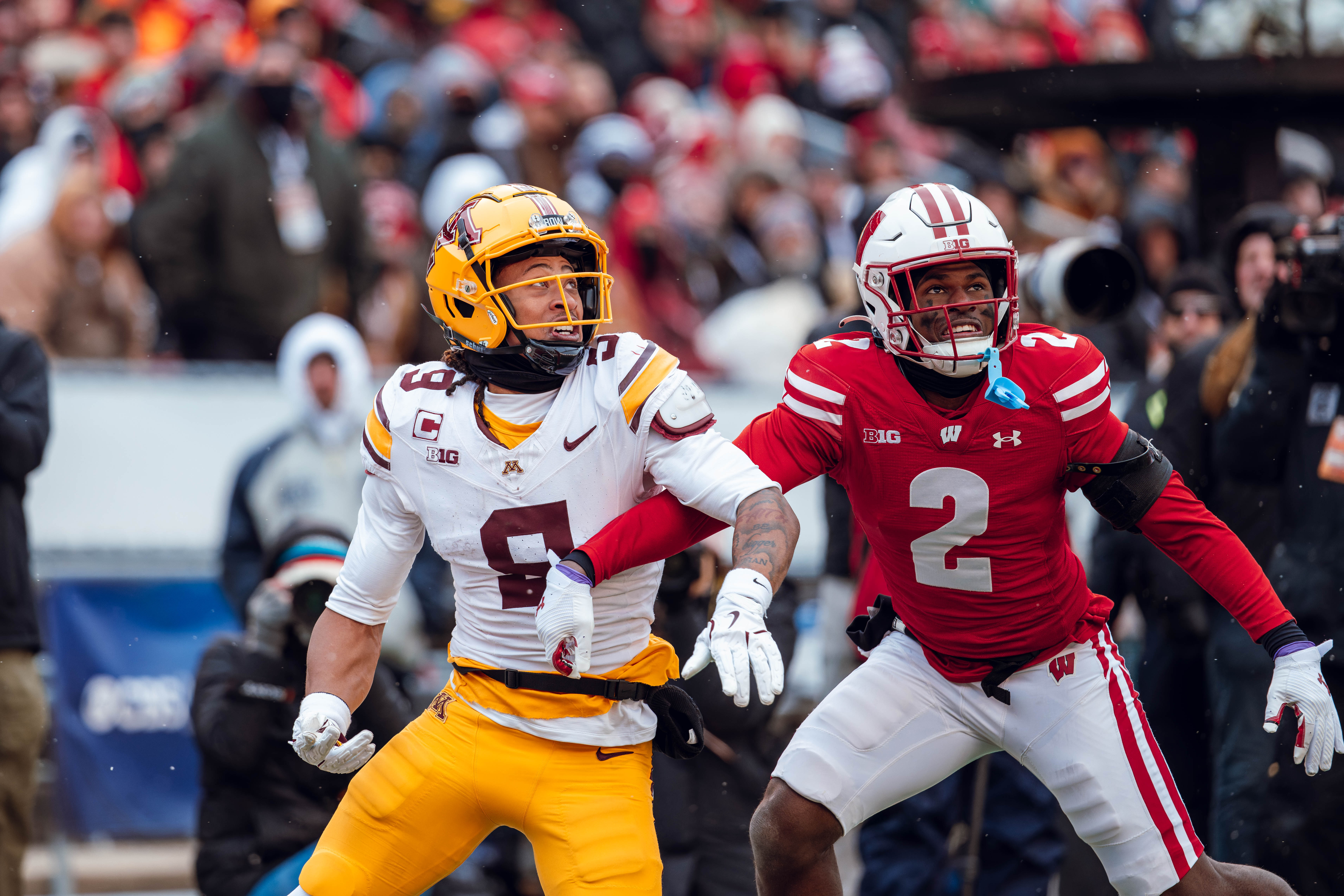 Wisconsin Badgers cornerback Ricardo Hallman #2 defends Minnesota Golden Gopher wide receiver Daniel Jackson #9 at Camp Randall Stadium on November 29, 2024 in Madison, Wisconsin. Photography by Ross Harried for Second Crop Sports.