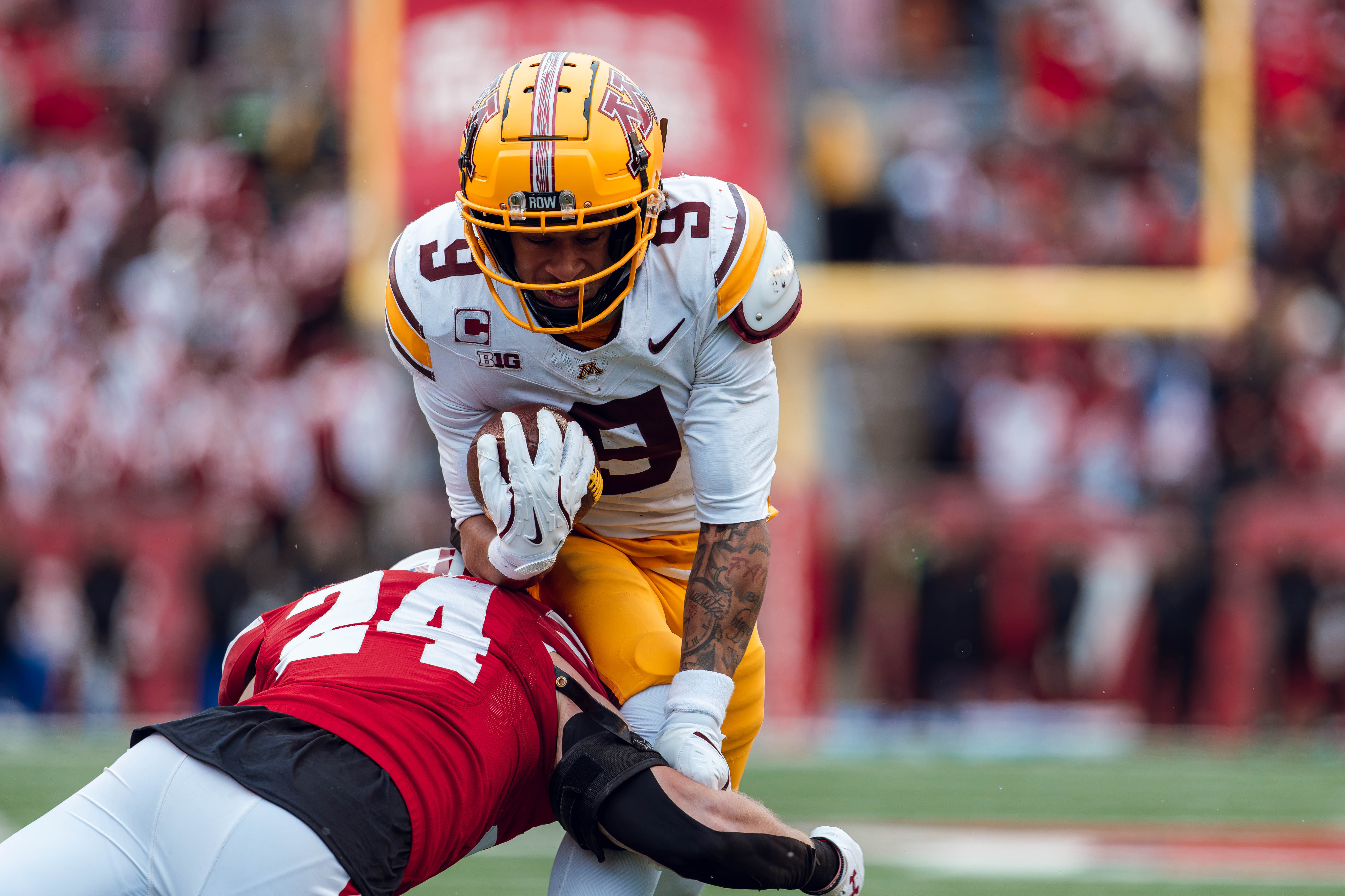 Minnesota Golden Gopher wide receiver Daniel Jackson #9 runs up field after receiving a short pass against the Wisconsin Badgers at Camp Randall Stadium on November 29, 2024 in Madison, Wisconsin. Photography by Ross Harried for Second Crop Sports.