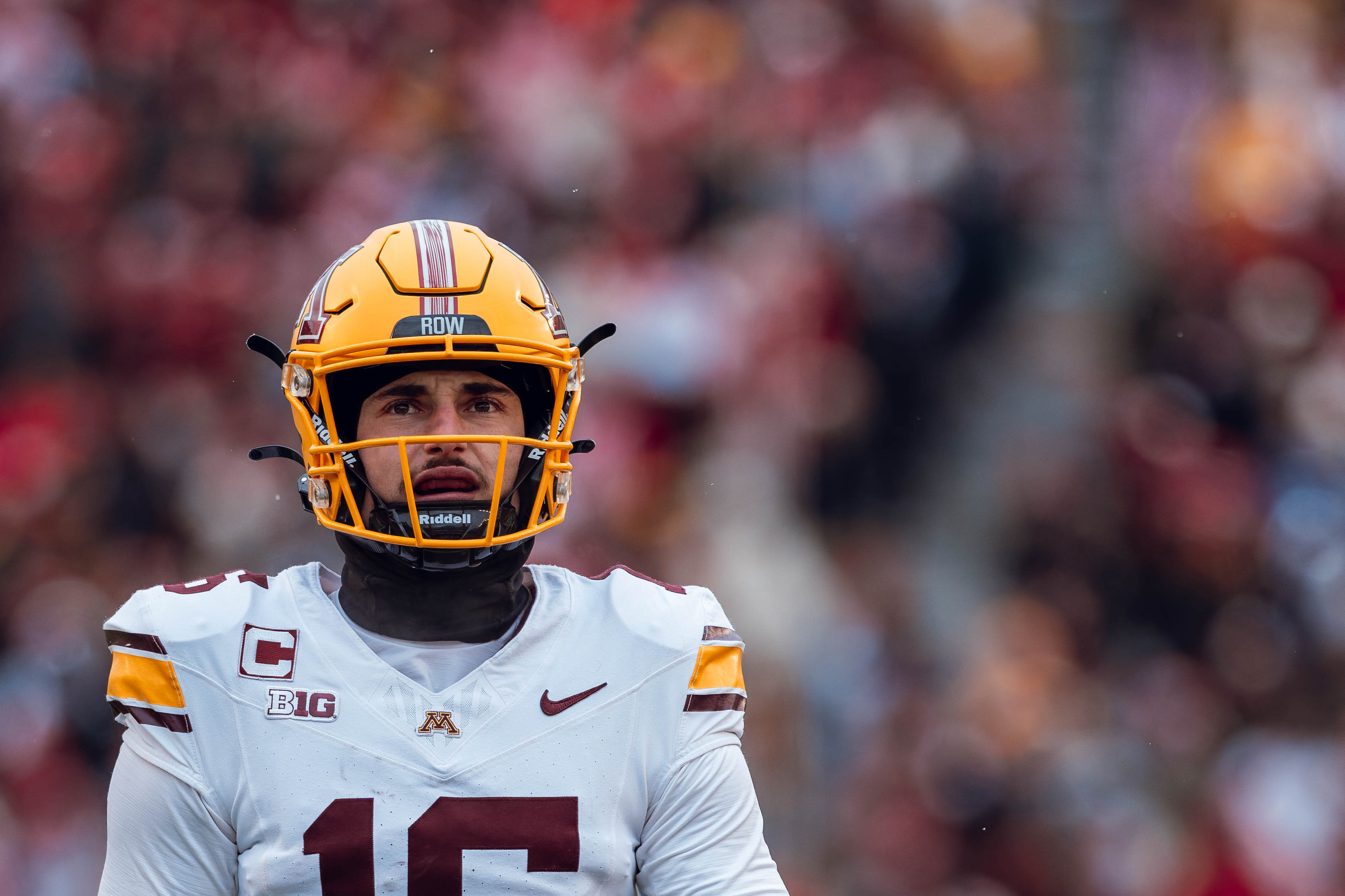 Minnesota Golden Gopher quarterback Max Brosmer #16 looks towards the scoreboard against the Wisconsin Badgers at Camp Randall Stadium on November 29, 2024 in Madison, Wisconsin. Photography by Ross Harried for Second Crop Sports.