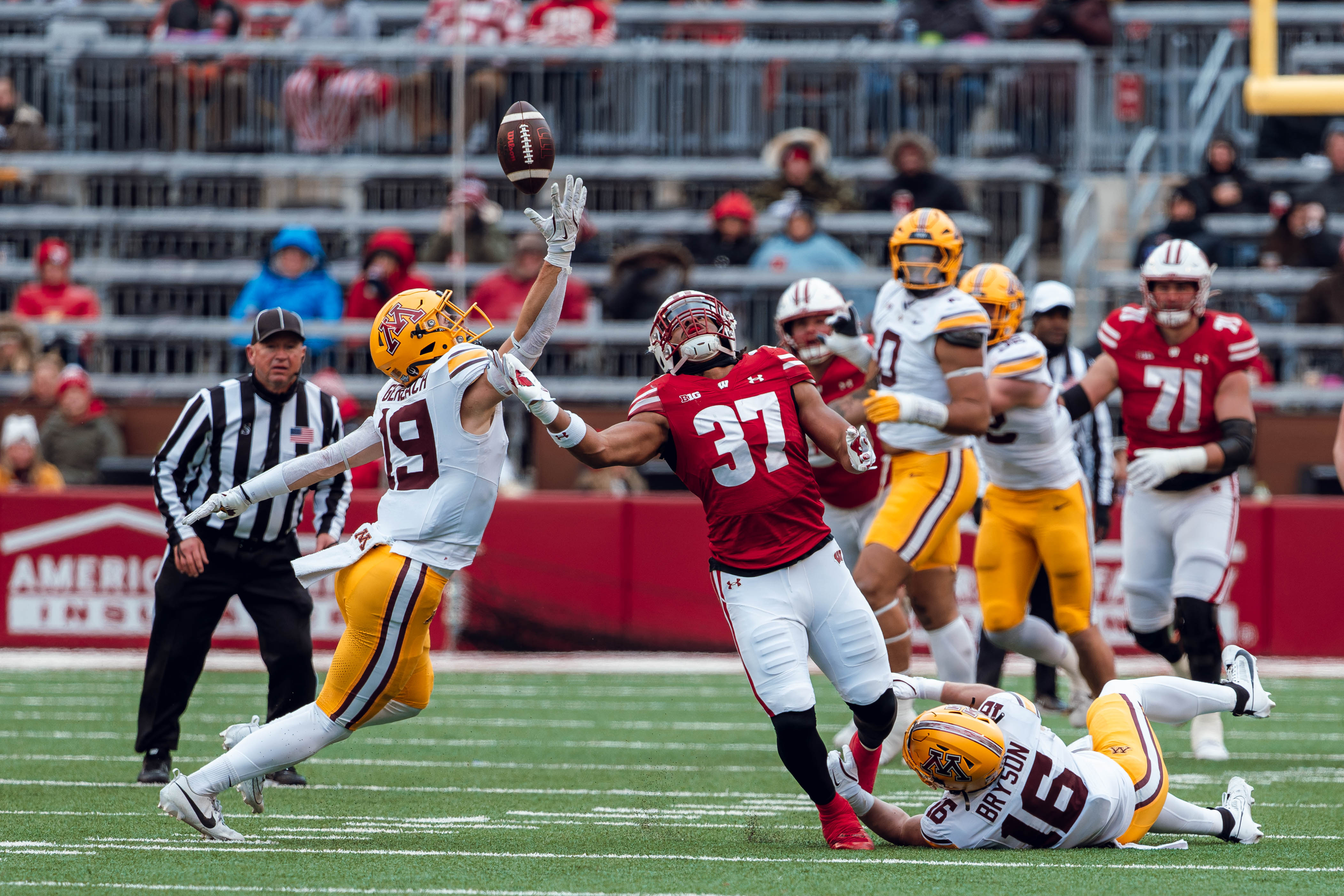 Wisconsin Badgers tight end Riley Nowakowski #37 bobbles a pass against the Minnesota Golden Gophers at Camp Randall Stadium on November 29, 2024 in Madison, Wisconsin. Photography by Ross Harried for Second Crop Sports.