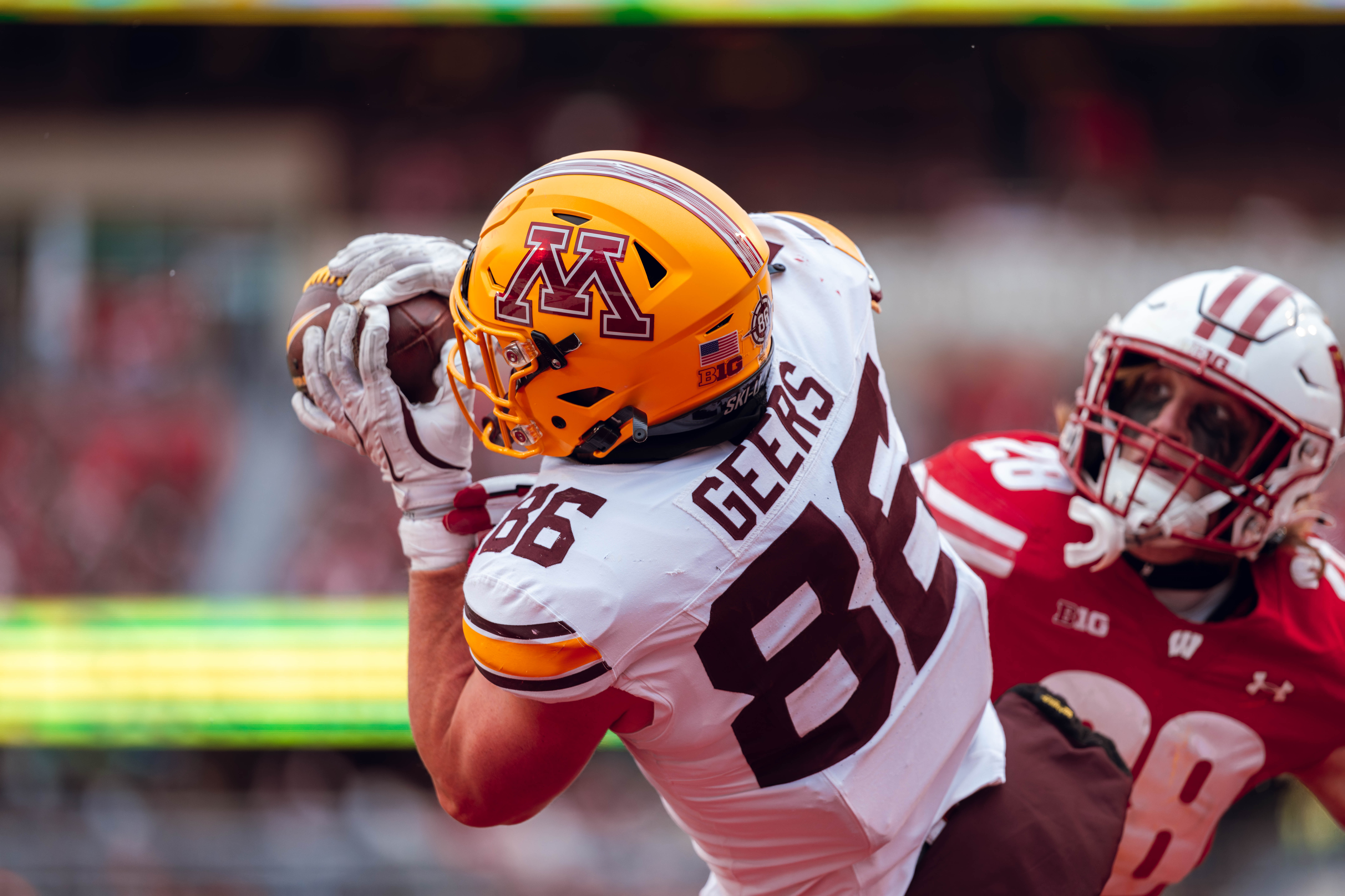 Minnesota Golden Gopher tight end Jameson Geers #86 hauls in a touchdown against the Wisconsin Badgers at Camp Randall Stadium on November 29, 2024 in Madison, Wisconsin. Photography by Ross Harried for Second Crop Sports.