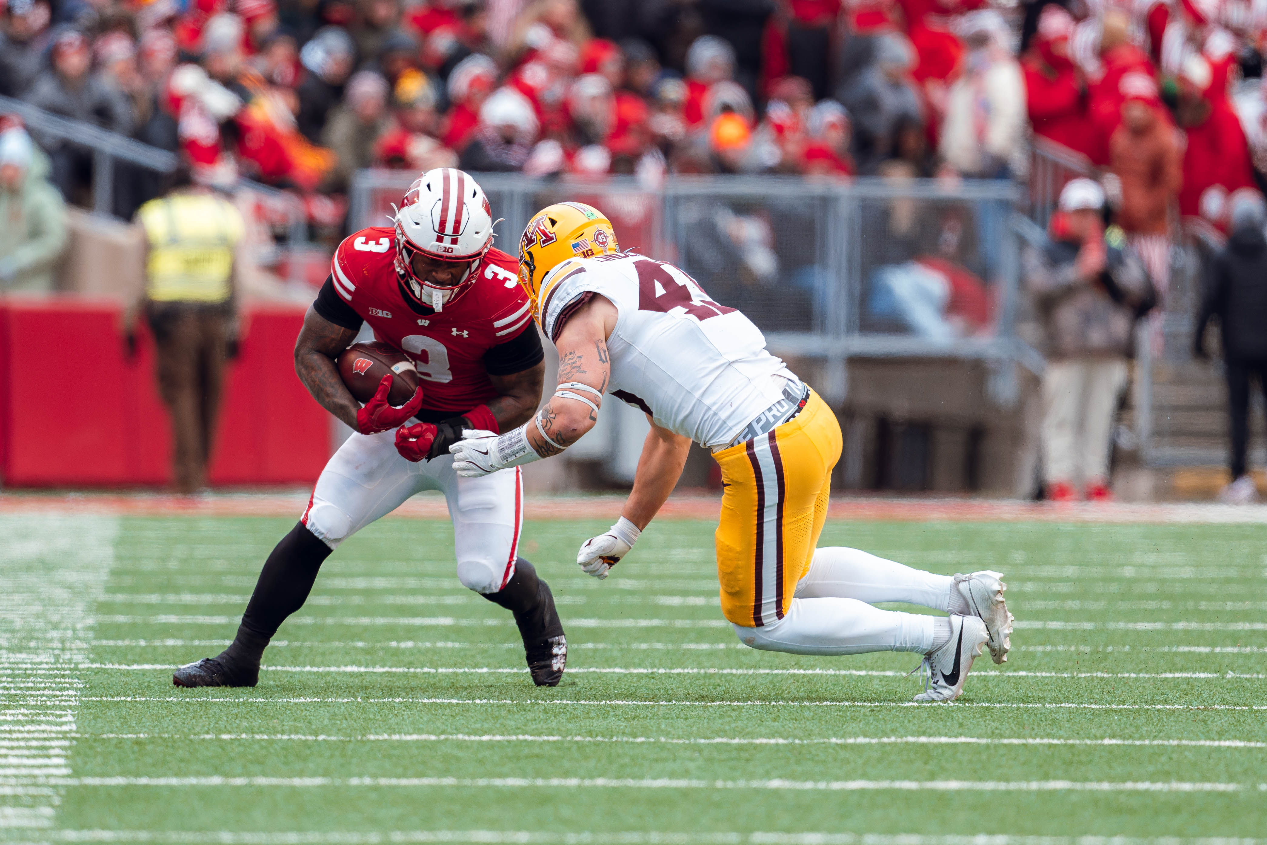 Wisconsin Badgers running back Tawee Walker #3 runs the ball against the Minnesota Golden Gophers at Camp Randall Stadium on November 29, 2024 in Madison, Wisconsin. Photography by Ross Harried for Second Crop Sports.