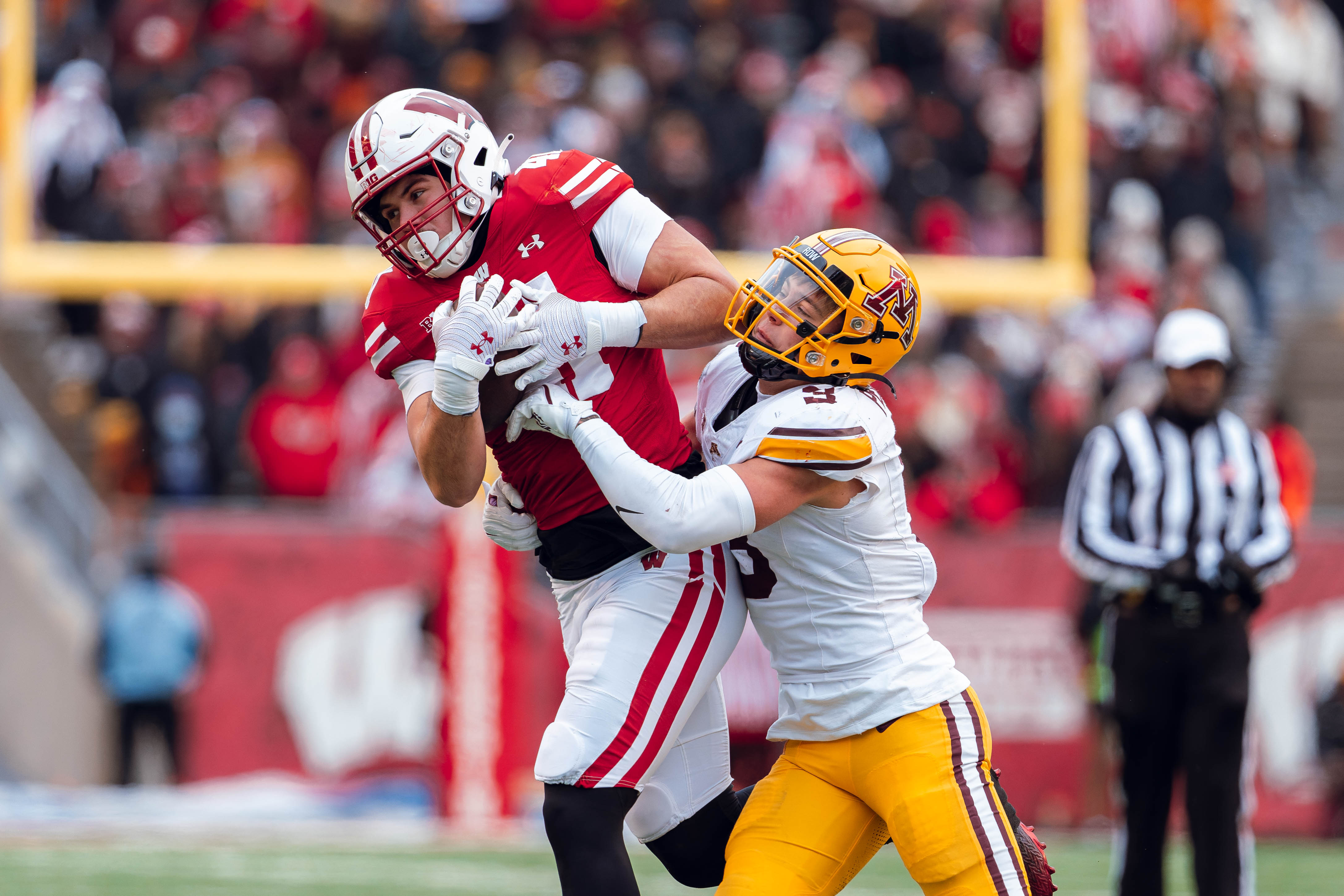 Wisconsin Badgers tight end JT Seagreaves #41 wrangles in a pass against the Minnesota Golden Gophers at Camp Randall Stadium on November 29, 2024 in Madison, Wisconsin. Photography by Ross Harried for Second Crop Sports.