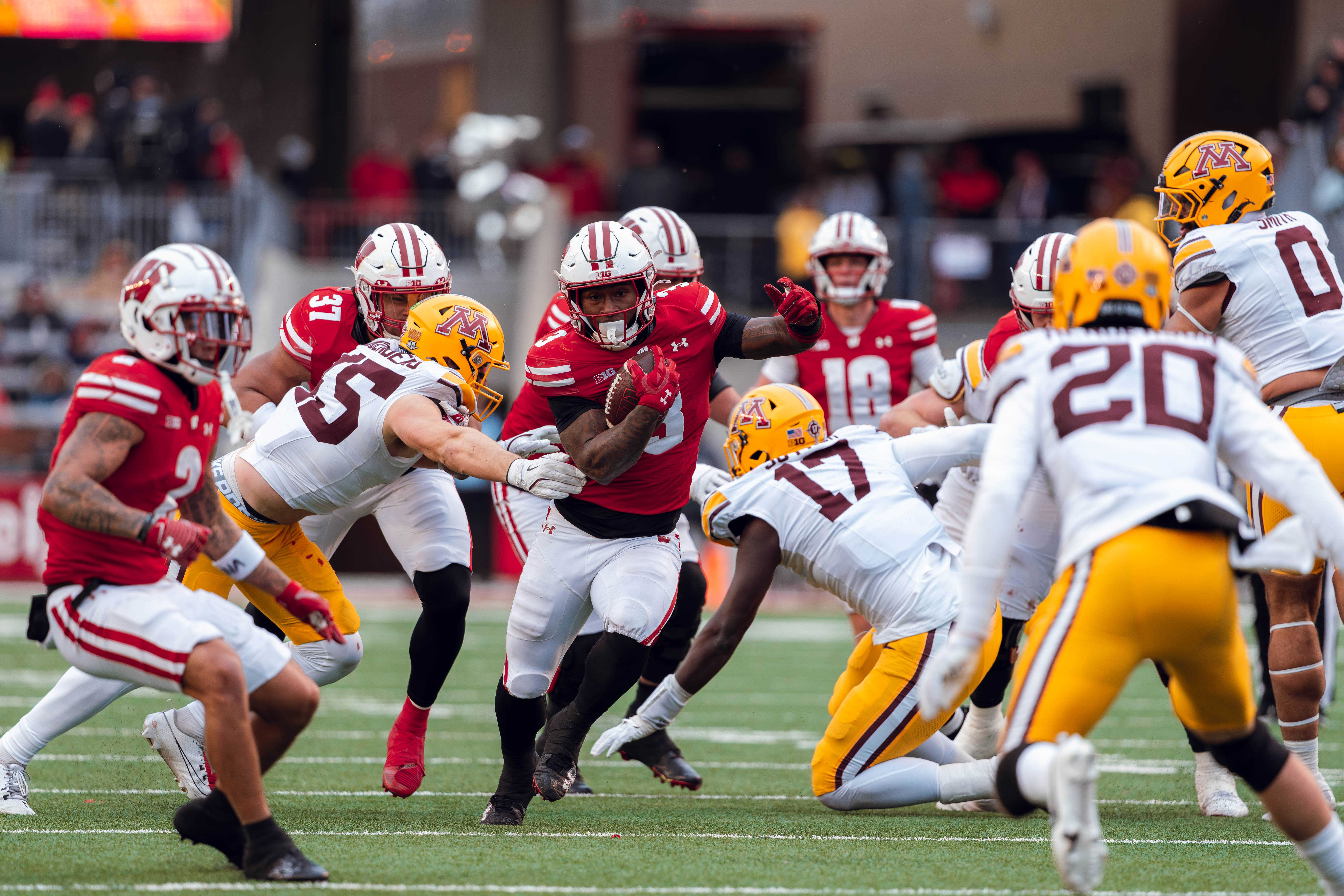 Wisconsin Badgers running back Tawee Walker #3 runs the ball against the Minnesota Golden Gophers at Camp Randall Stadium on November 29, 2024 in Madison, Wisconsin. Photography by Ross Harried for Second Crop Sports.