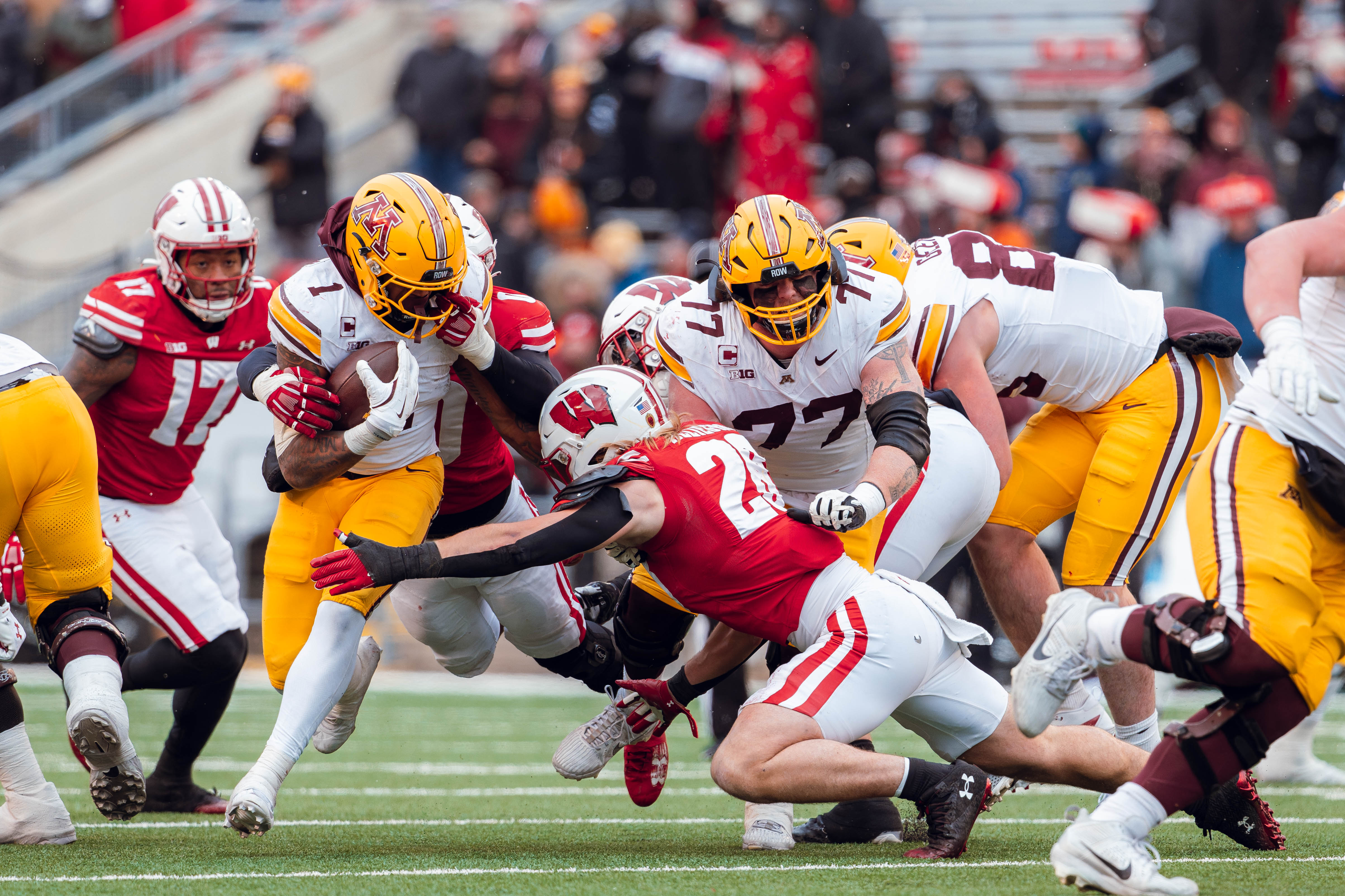 Minnesota Golden Gopher running back Darius Taylor #1 runs the ball against the Wisconsin Badgers at Camp Randall Stadium on November 29, 2024 in Madison, Wisconsin. Photography by Ross Harried for Second Crop Sports.