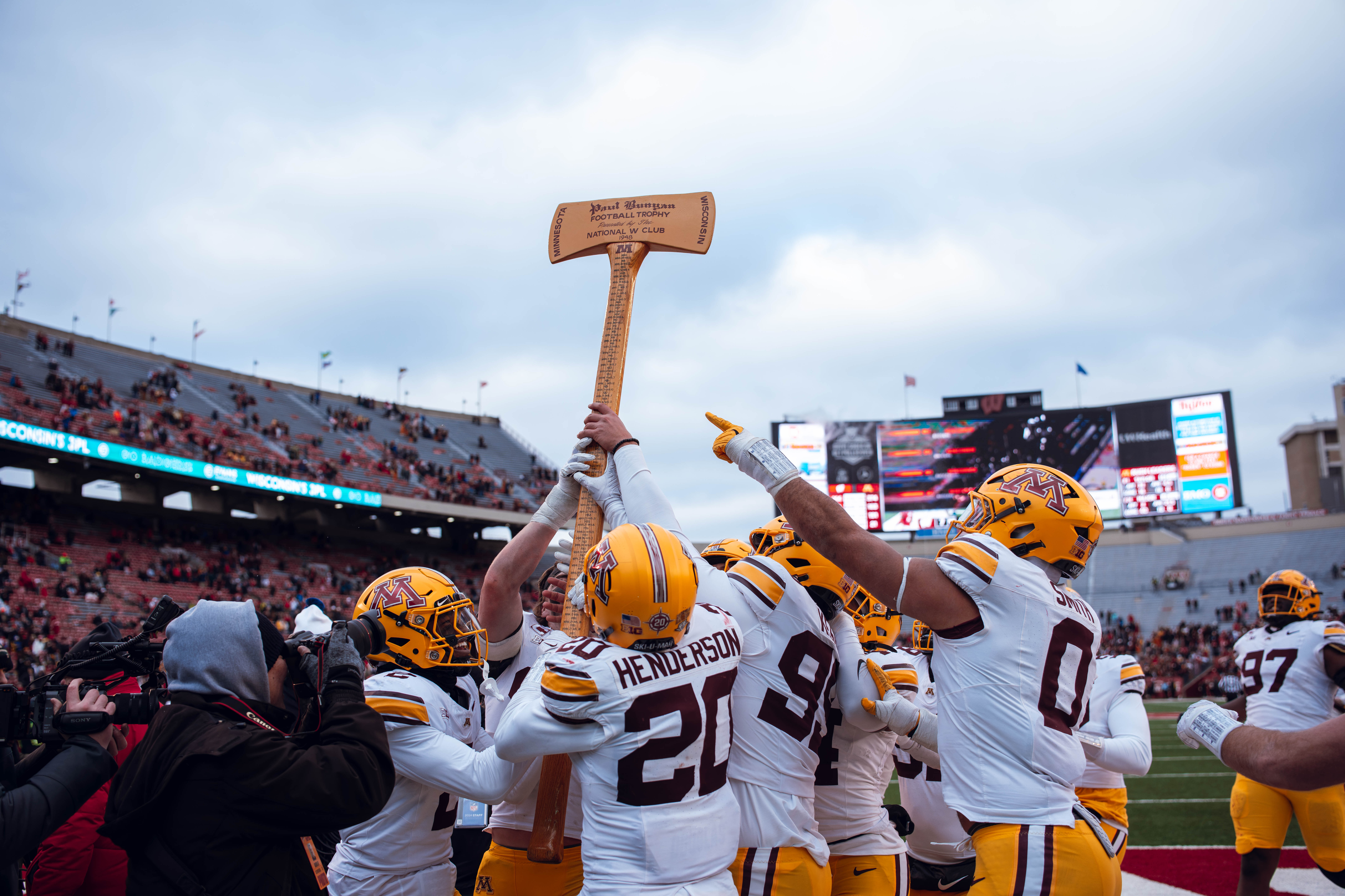 The Minnesota Golden Gophers take home the Paul Bunyan Axe against the Wisconsin Badgers at Camp Randall Stadium on November 29, 2024 in Madison, Wisconsin. Photography by Ross Harried for Second Crop Sports.