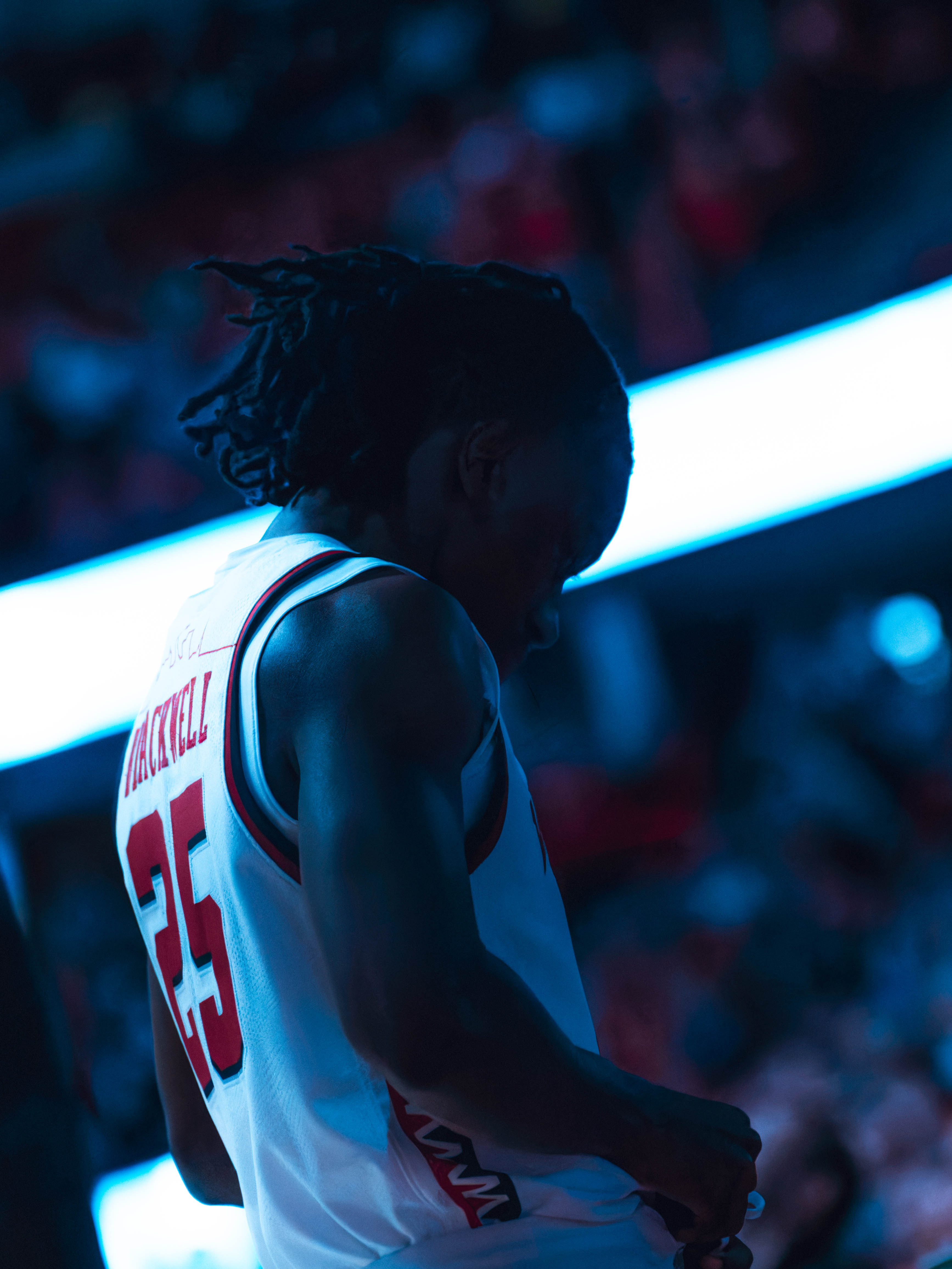 Wisconsin Badgers guard John Blackwell #25 adjust his shorts before taking on the Michigan Wolverines at the Kohl Center on December 03, 2024 in Madison, Wisconsin. Photography by Ross Harried for Second Crop Sports.