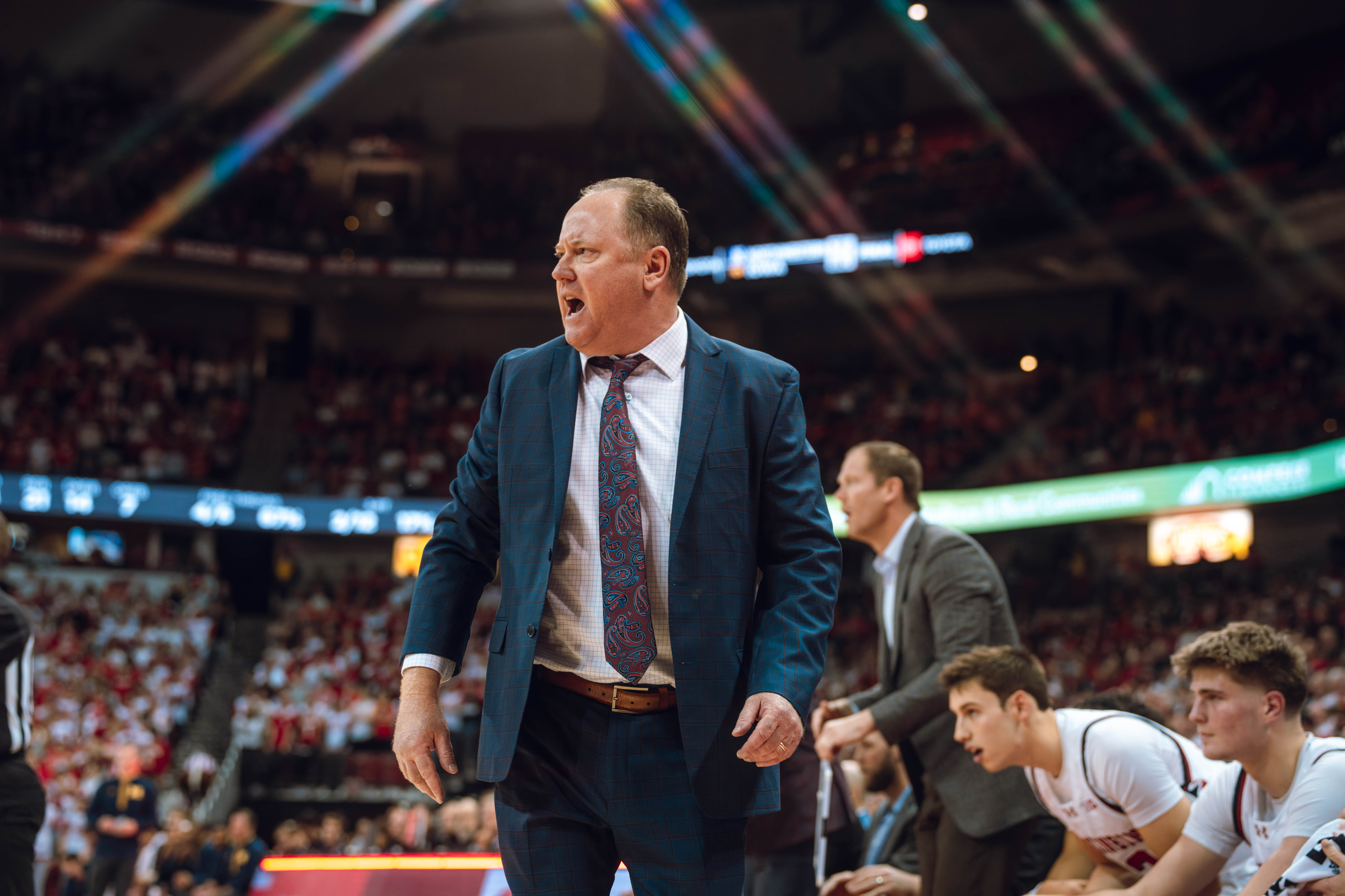 Wisconsin Badgers head coach Greg Gard argues a foul as the Wisconsin Badgers take on the Michigan Wolverines at the Kohl Center on December 03, 2024 in Madison, Wisconsin. Photography by Ross Harried for Second Crop Sports.