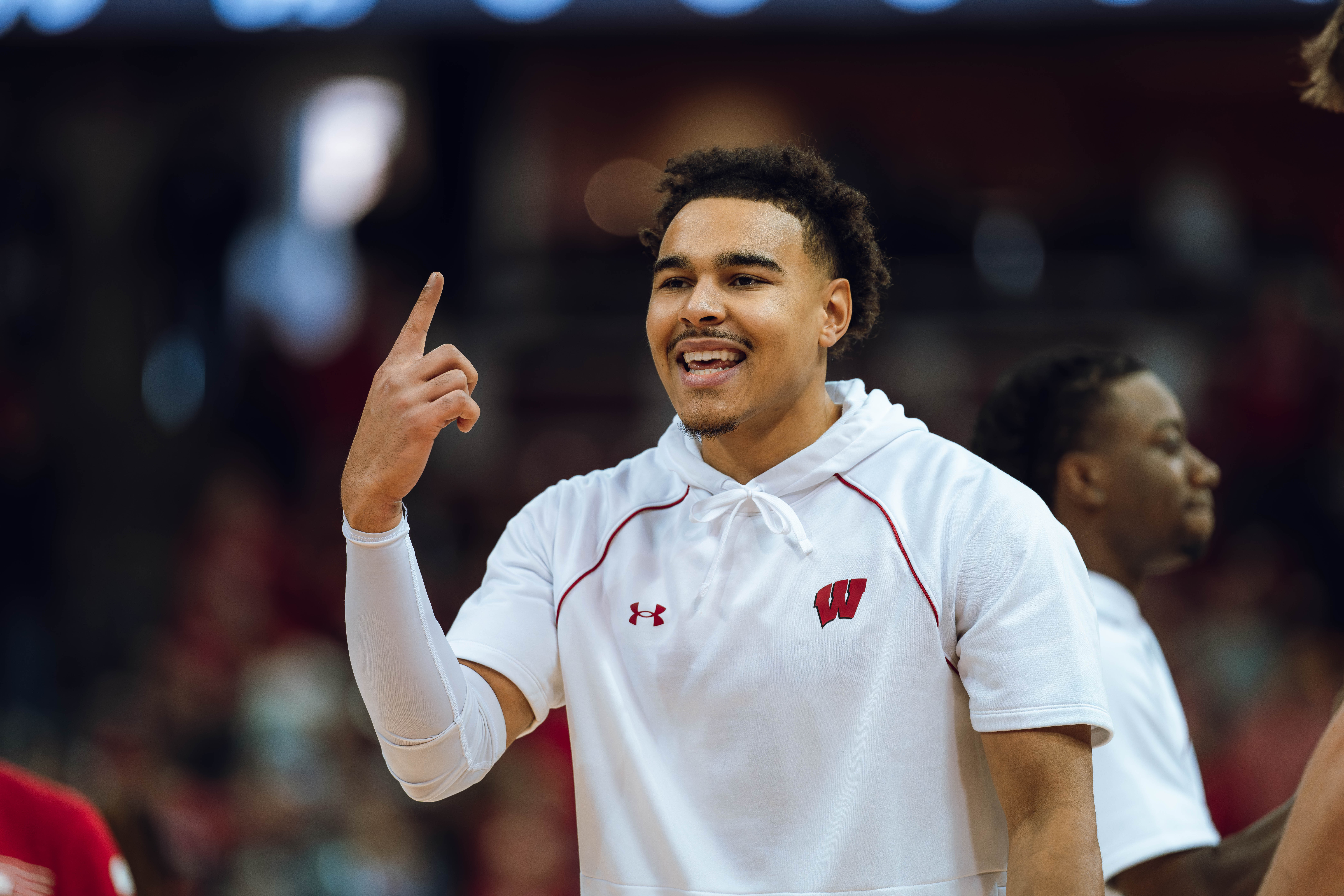 Wisconsin Badgers guard John Tonje #9 during warmups against the Detroit Mercy Titans at Kohl Center on December 22, 2024 in Madison, Wisconsin. Photography by Ross Harried for Second Crop Sports.