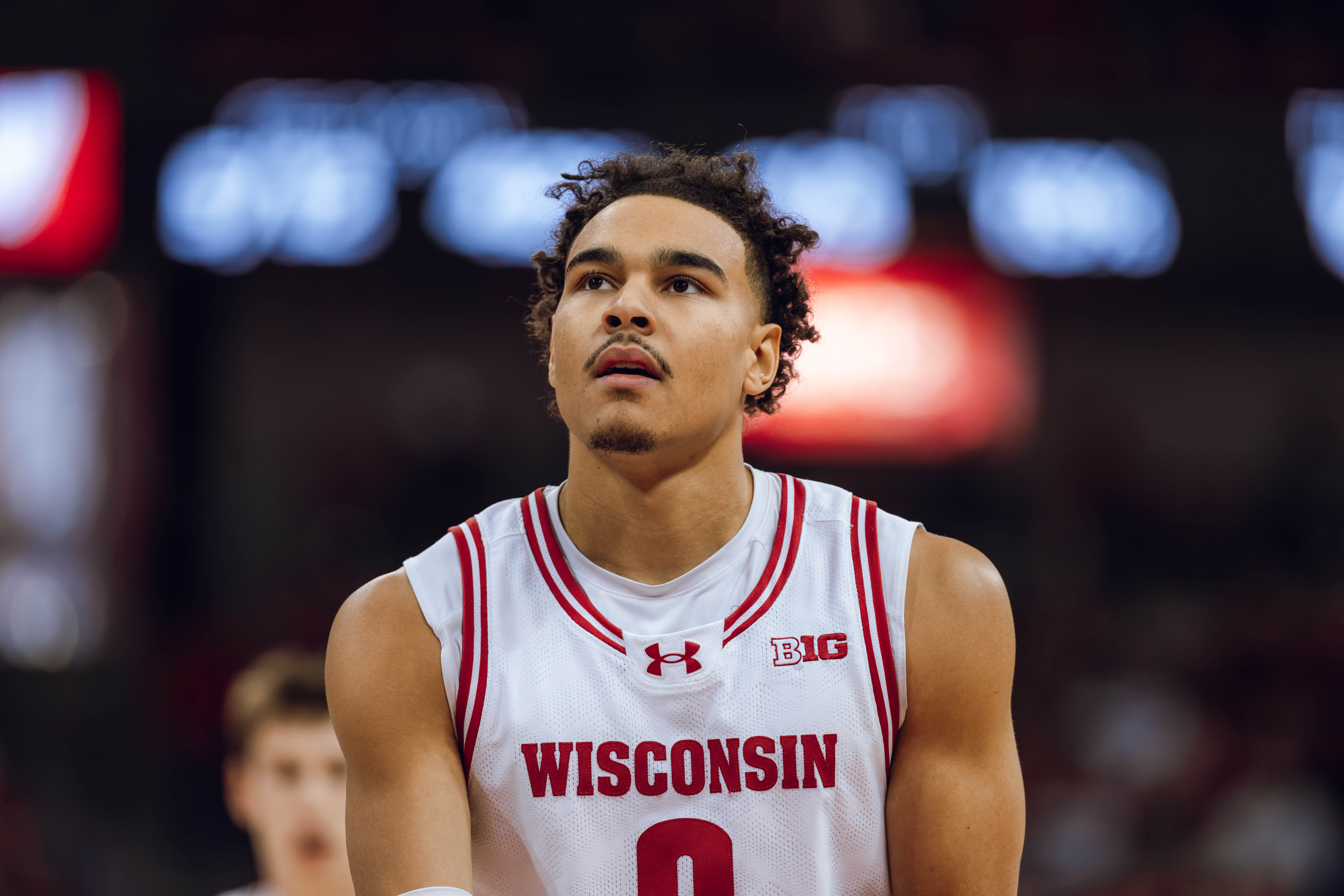 Wisconsin Badgers guard John Tonje #9 eyes the rim before a free throw against the Detroit Mercy Titans at Kohl Center on December 22, 2024 in Madison, Wisconsin. Photography by Ross Harried for Second Crop Sports.