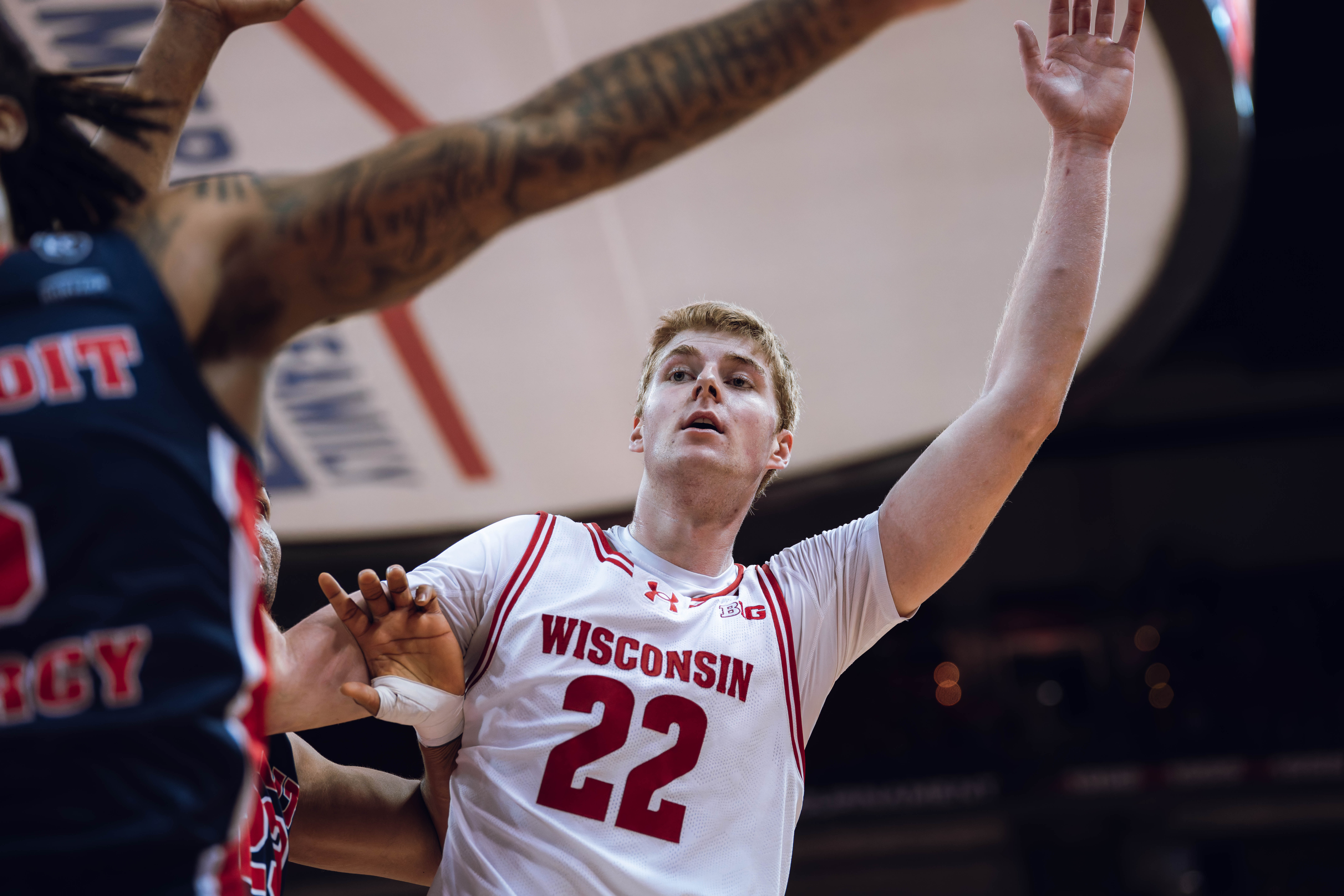 Wisconsin Badgers forward Steven Crowl #22 calls for the ball during an inbounds play against the Detroit Mercy Titans at Kohl Center on December 22, 2024 in Madison, Wisconsin. Photography by Ross Harried for Second Crop Sports.