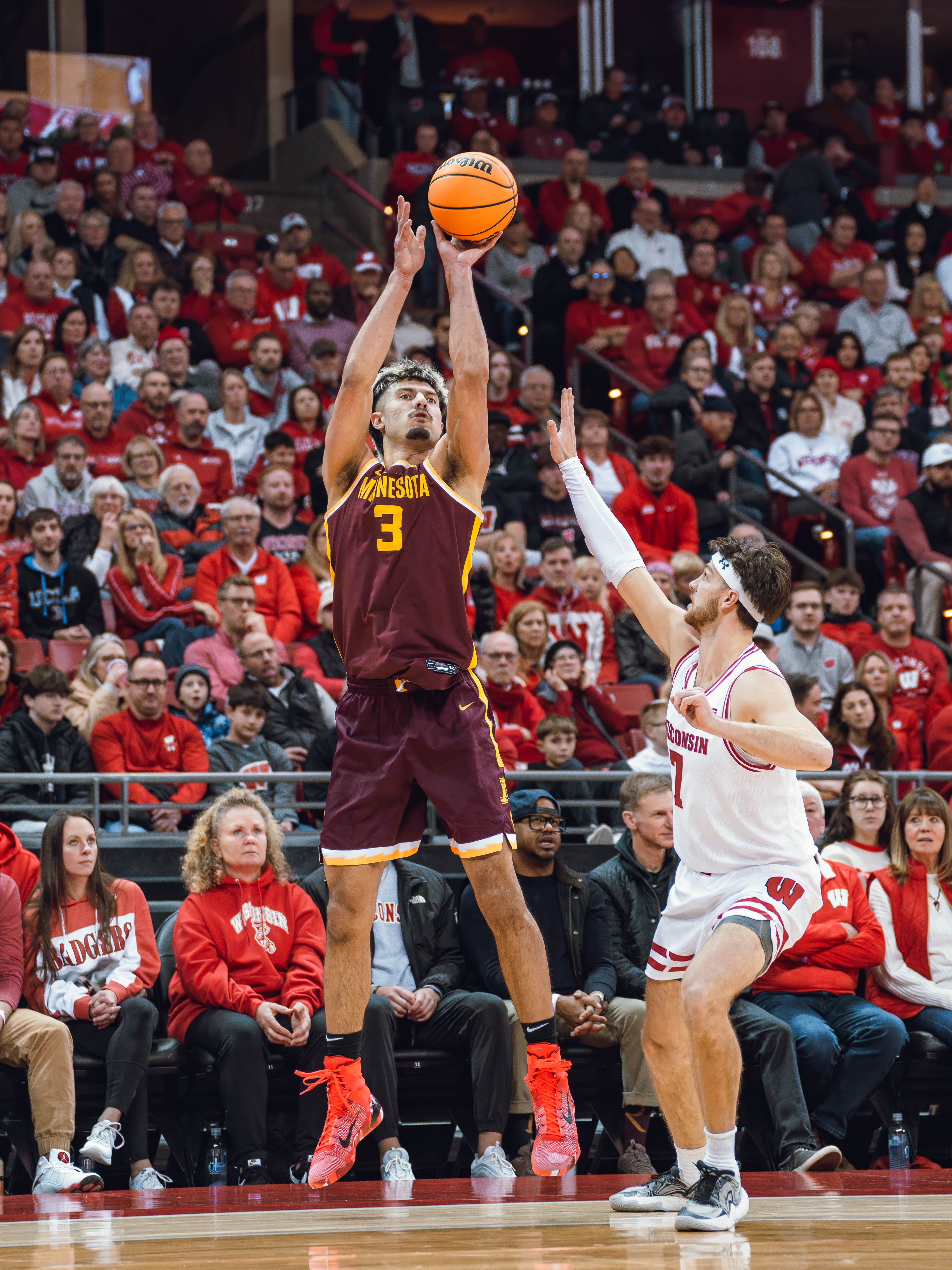 Minnesota Golden Gophers forward Dawson Garcia #3 shoots over Wisconsin Badgers forward Carter Gilmore #7 at Kohl Center on January 10, 2025 in Madison, Wisconsin. Photography by Ross Harried for Second Crop Sports.