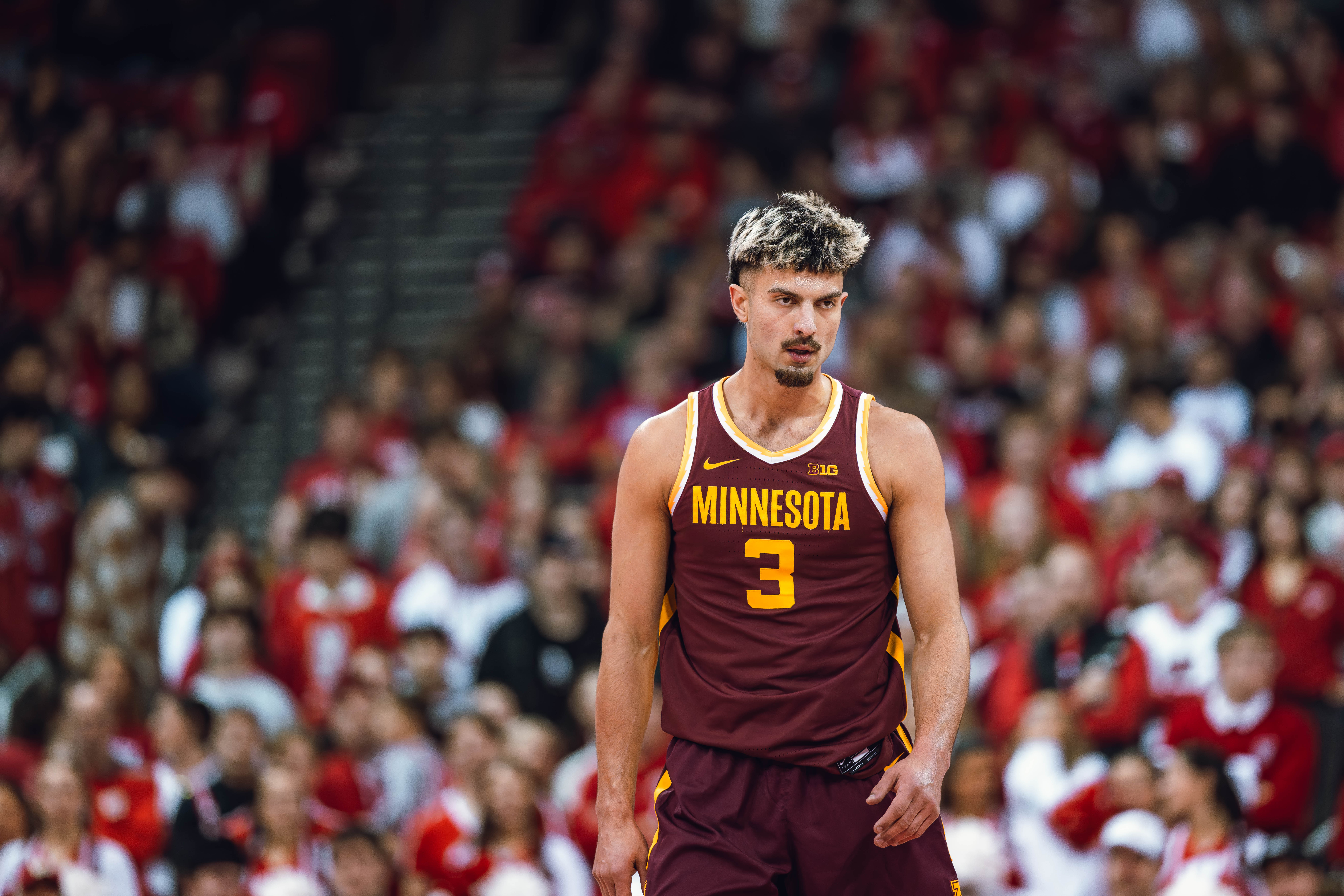 A look of frustration washes over Minnesota Golden Gophers forward Dawson Garcia #3 during a game against the Wisconsin Badgers at Kohl Center on January 10, 2025 in Madison, Wisconsin. Photography by Ross Harried for Second Crop Sports.