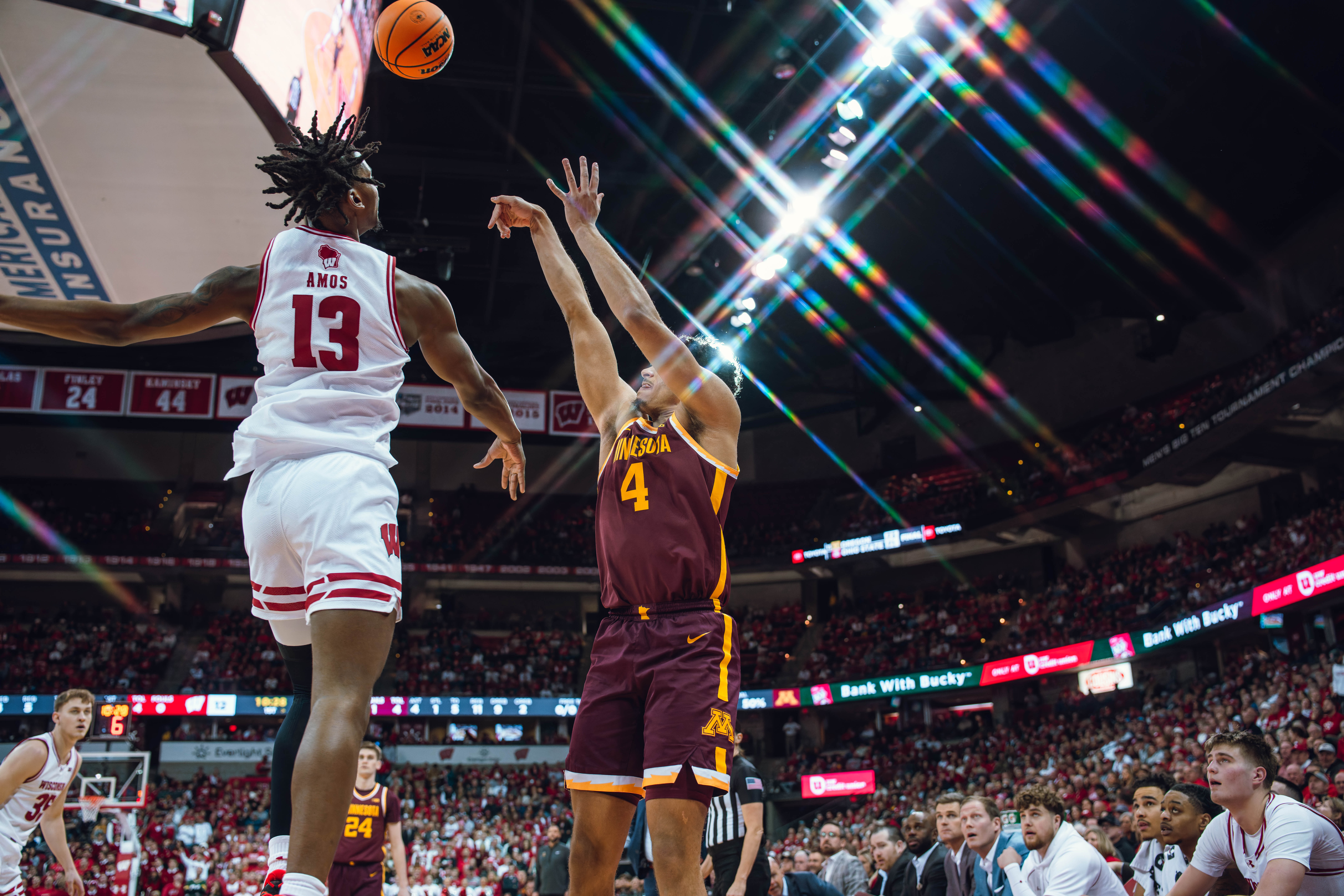 Minnesota Golden Gophers forward Kadyn Betts #4 has his shot blocked by Wisconsin Badgers forward Xavier Amos #13 at Kohl Center on January 10, 2025 in Madison, Wisconsin. Photography by Ross Harried for Second Crop Sports.