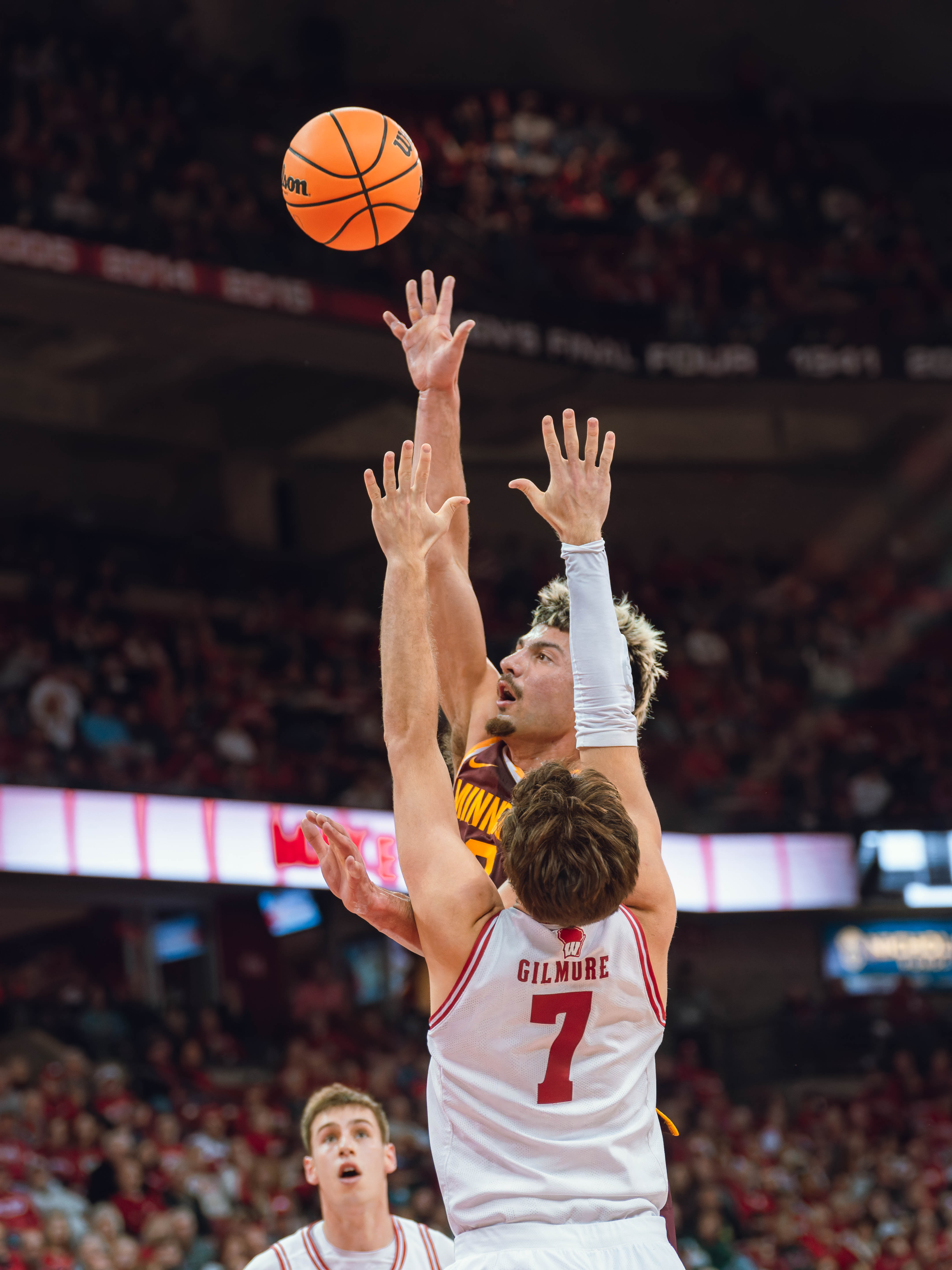 Minnesota Golden Gophers forward Dawson Garcia #3 shoots overWisconsin Badgers forward Carter Gilmore #7 at Kohl Center on January 10, 2025 in Madison, Wisconsin. Photography by Ross Harried for Second Crop Sports.