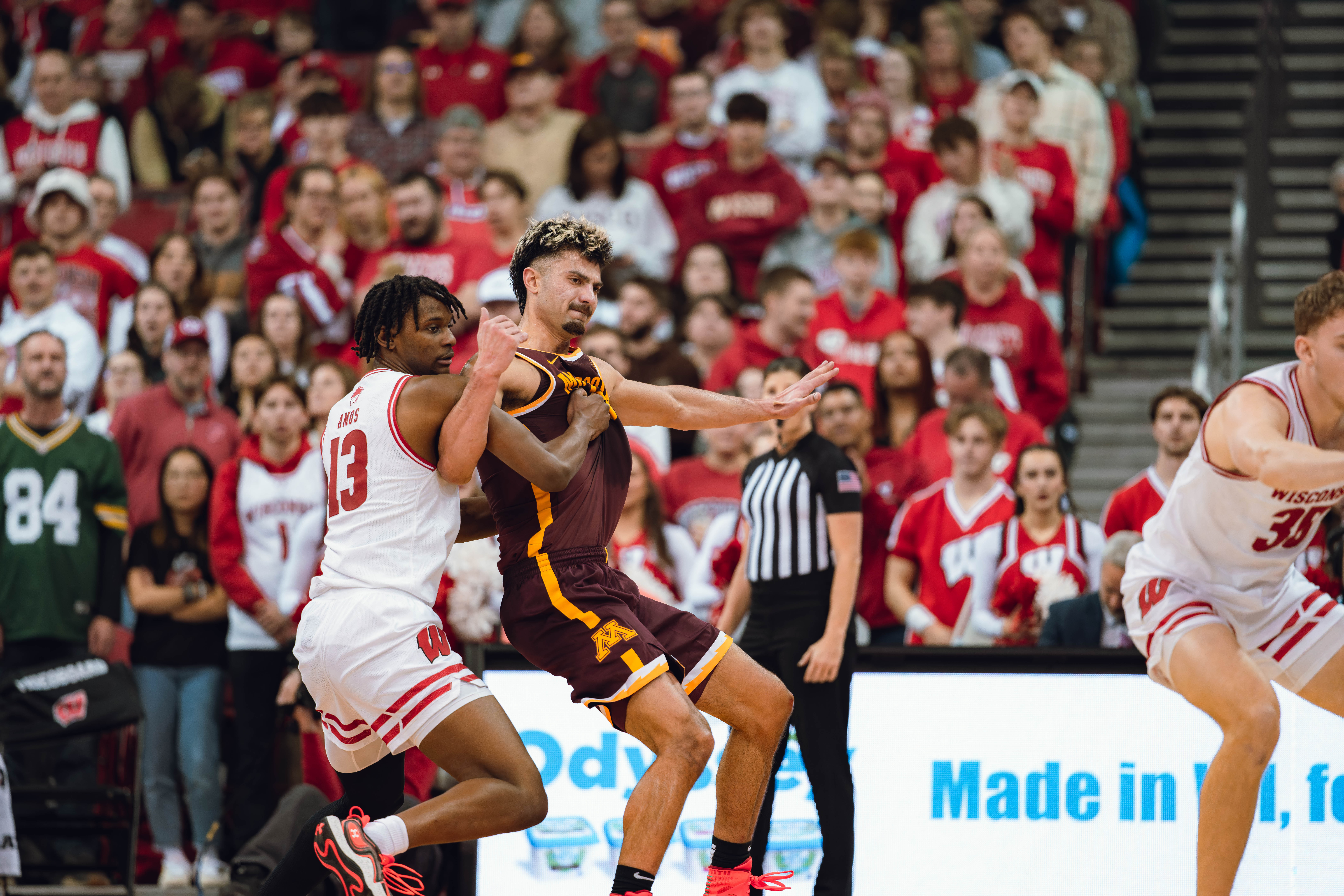 Wisconsin Badgers forward Xavier Amos #13 and Minnesota Golden Gophers forward Dawson Garcia #3 battle down low at Kohl Center on January 10, 2025 in Madison, Wisconsin. Photography by Ross Harried for Second Crop Sports.