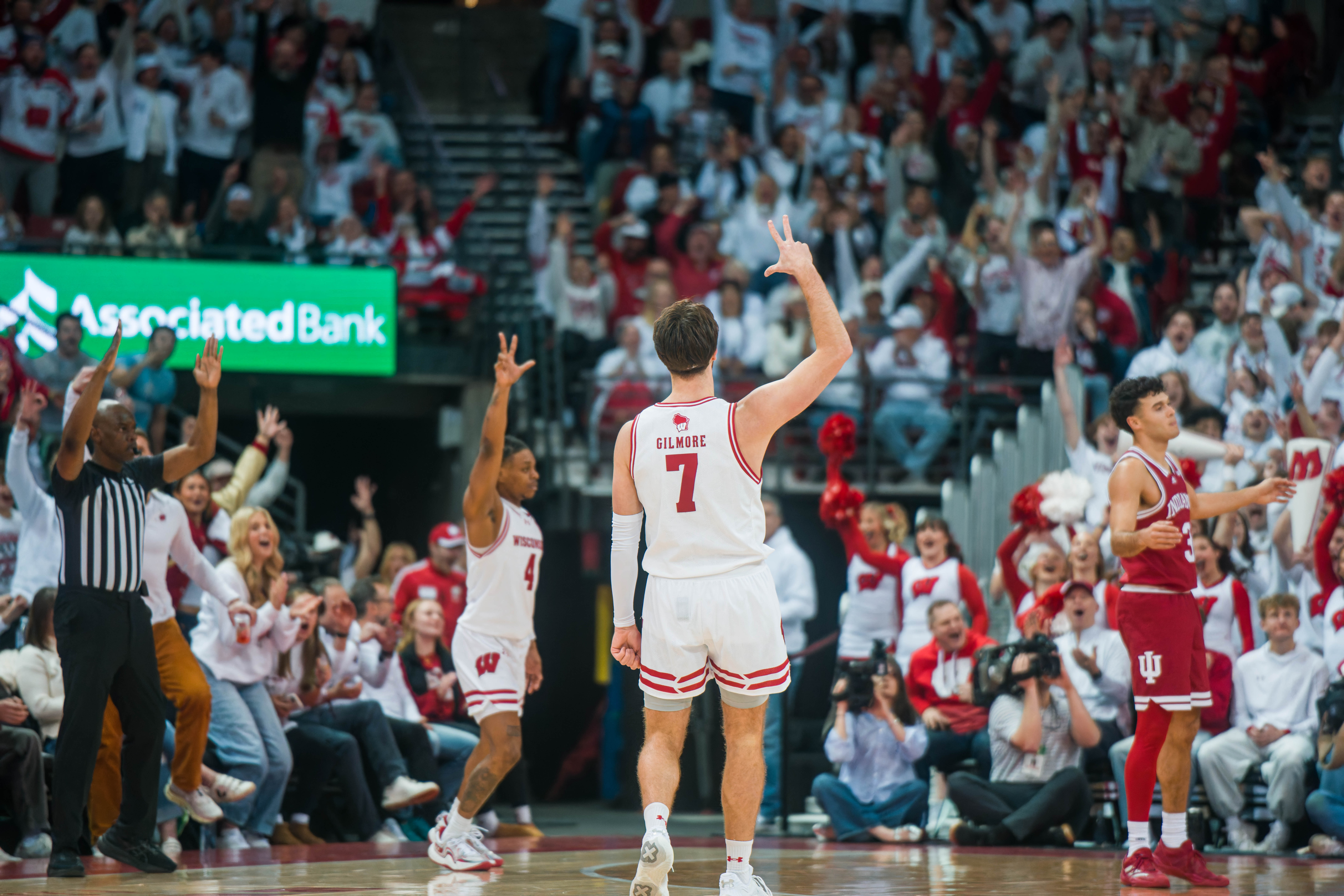 Wisconsin Badgers forward Carter Gilmore #7 celebrates a three pointer against the Indiana Hoosiers at the Kohl Center on February 04, 2025 in Madison, Wisconsin. Photography by Ross Harried for Second Crop Sports.